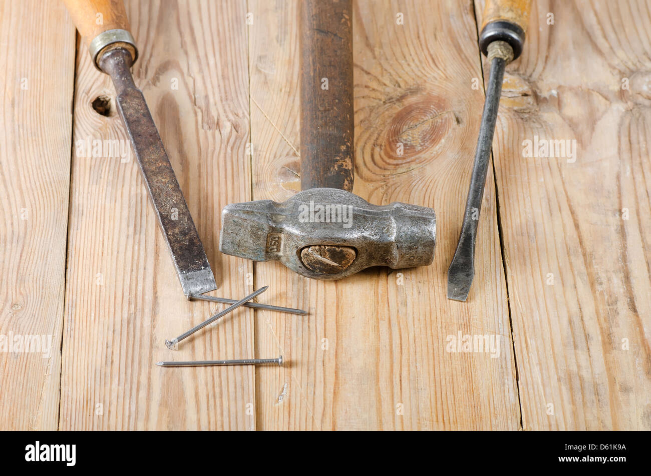 Set building tools on old boards Stock Photo - Alamy