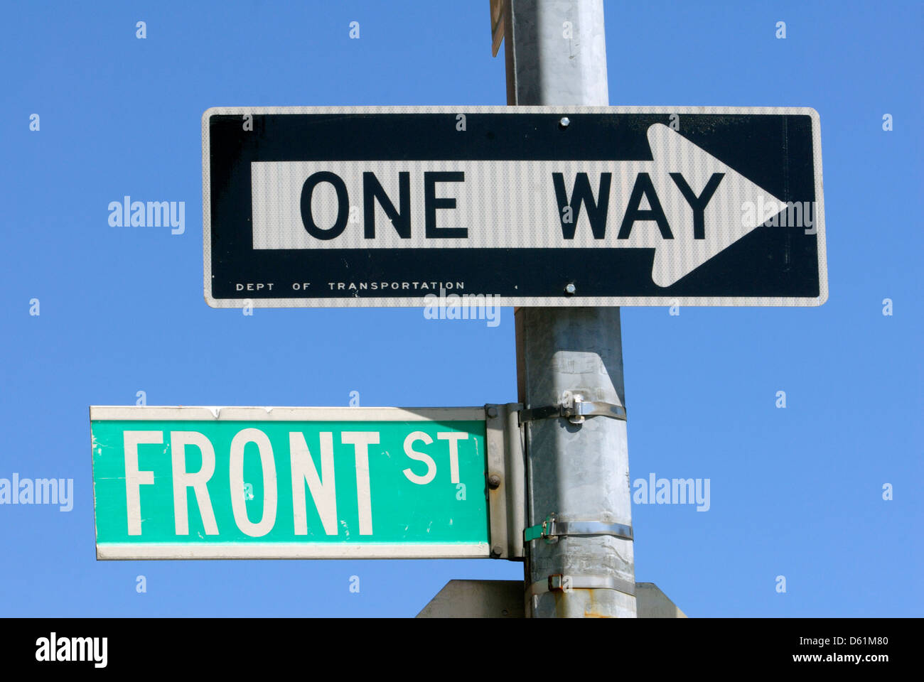 One way, Front St., street signs in New York City, New York, USA Stock Photo