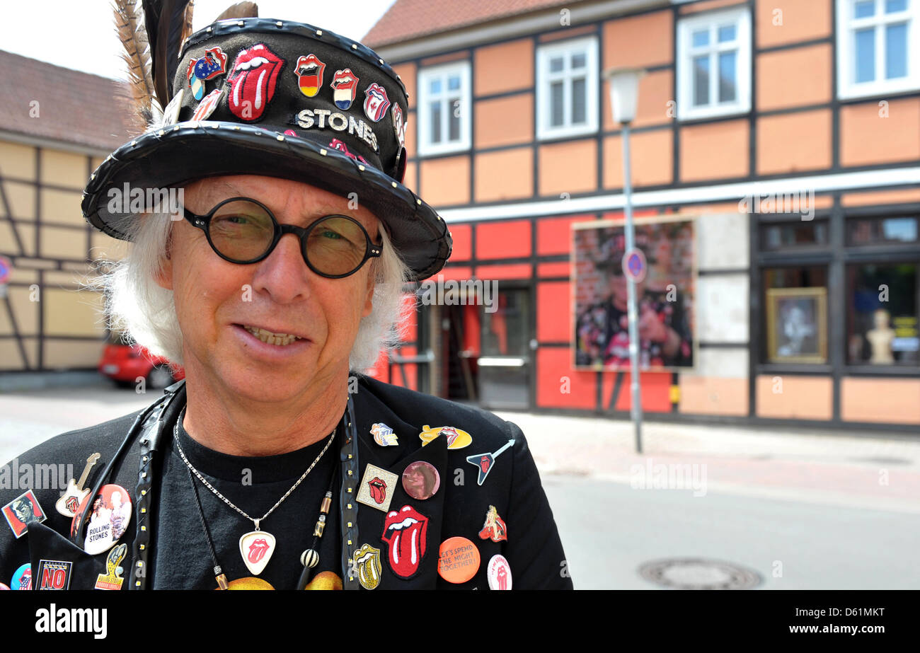 The owner of the Rolling Stones - Museum, Ulrich Schroeder, poses in front  of his Stones Fan Museum in Luechow, Germany, 27 January 2012. The  worldwide first and only Rolling Stones Museum