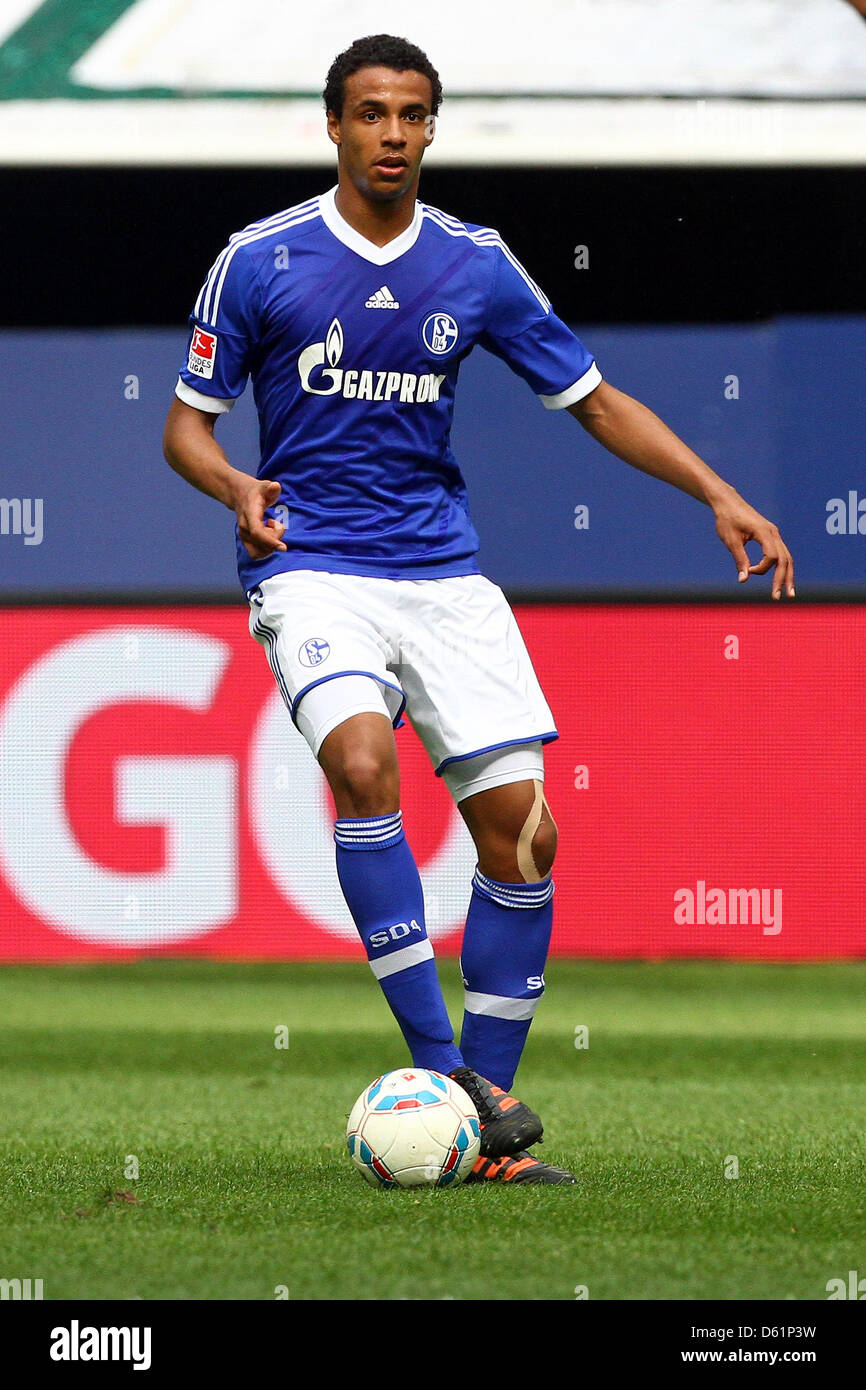Schalke's Joel Matip in action with the ball during the Bundesliga soccer match between  FC Schalke 04 and Hertha BSC at the Veltins-Arena in Gelsenkirchen, Germany, 28 April 2012. Photo: Caroline Seidel  (ATTENTION: EMBARGO CONDITIONS! The DFL permits the further utilisation of the pictures in IPTV, mobile services and other new technologies only no earlier than two hours after th Stock Photo