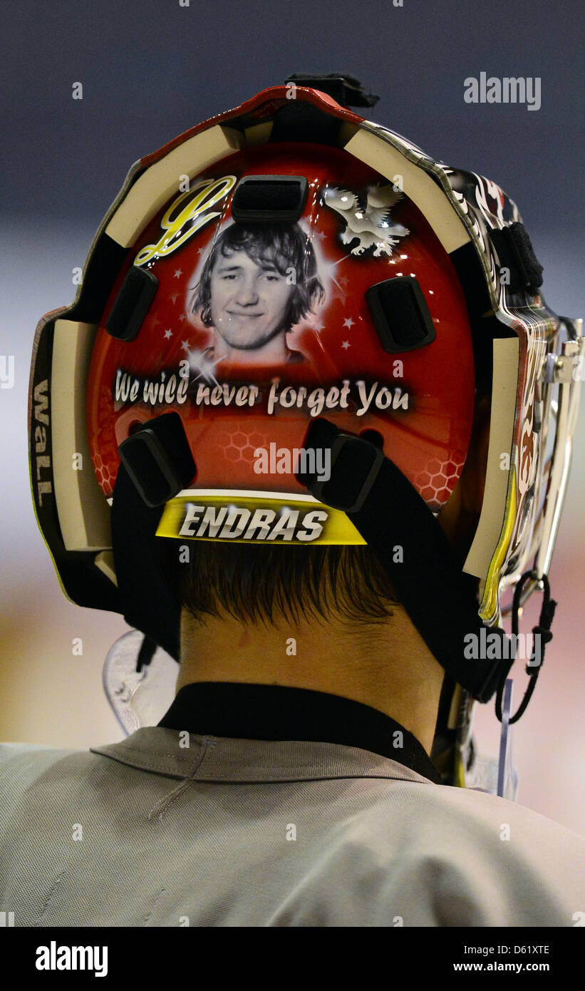 Germany's goalkeeper Dennis Endras sports an image of German ice hockey