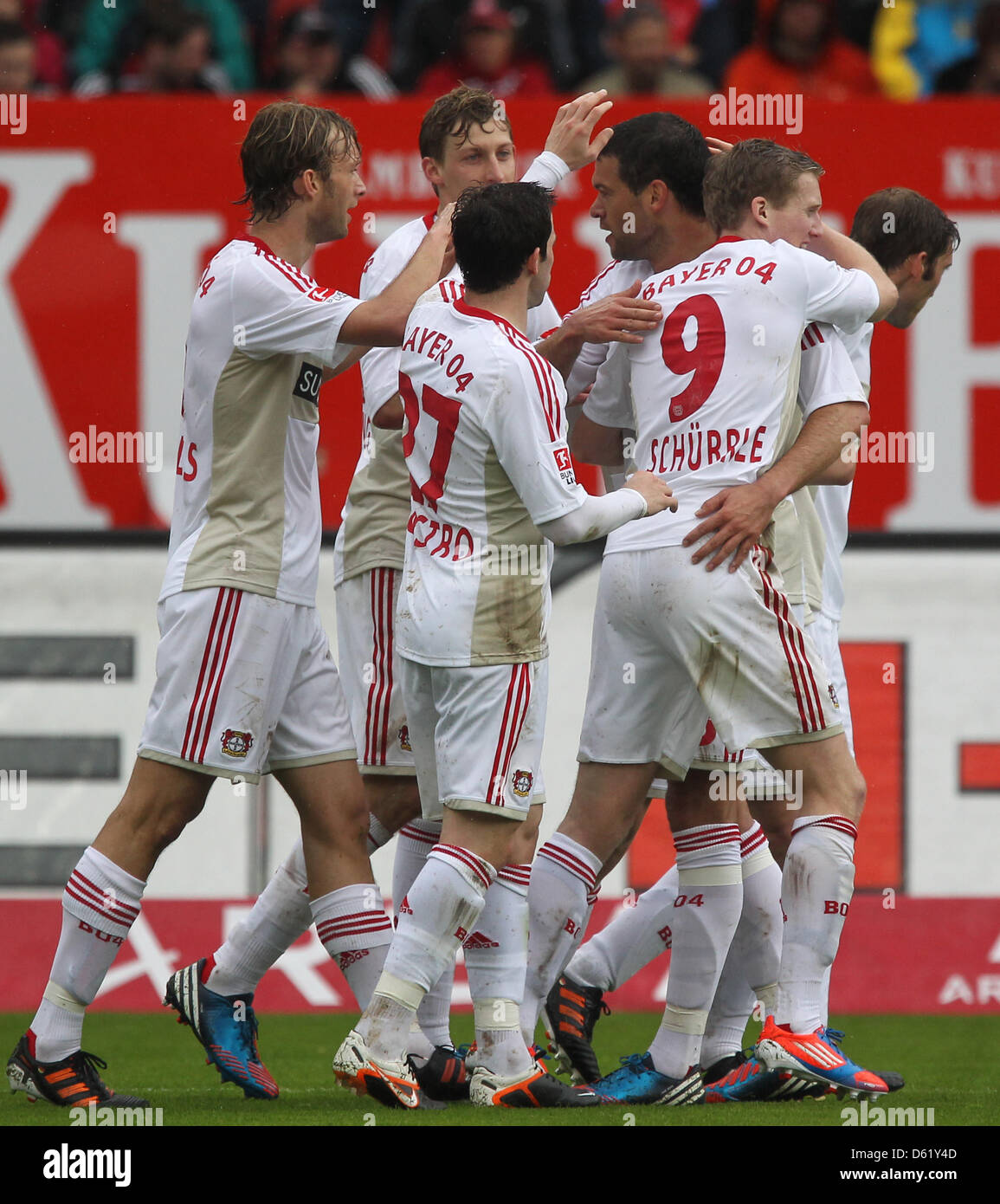 Leverkusen's Stefan Kiessling (2-L) celebrates his 0-2 goal with team-mates Simon Rolfes (L), Gonzalo Castro (3-L), Michael Ballack (3-R) and Andre Schuerrle (2-R) during the Bundesliga soccer match between 1. FC Nuremberg and Bayer 04 Leverkusen at easyCredit Stadion in Nuremberg, Germany, 05 May 2012. Photo: DANIEL KARMANN  (ATTENTION: EMBARGO CONDITIONS! The DFL permits the furt Stock Photo