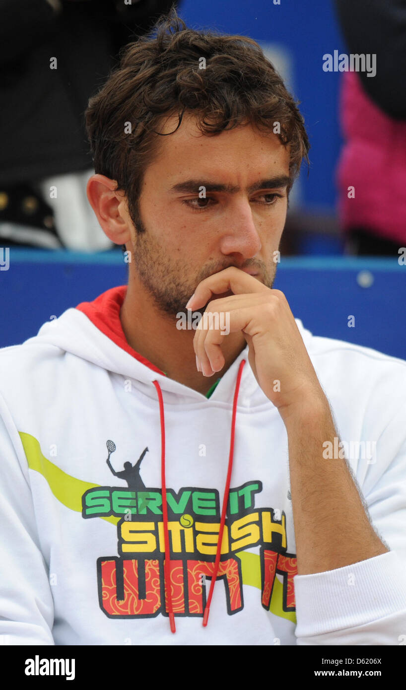 Croatian tennis player Marin Cilic looks disappointed after losing the final of the ATP tournament to Kohlschreiber from Germany in Munich, Germany, 06 May 2012. Photo: MARC MUELLER Stock Photo