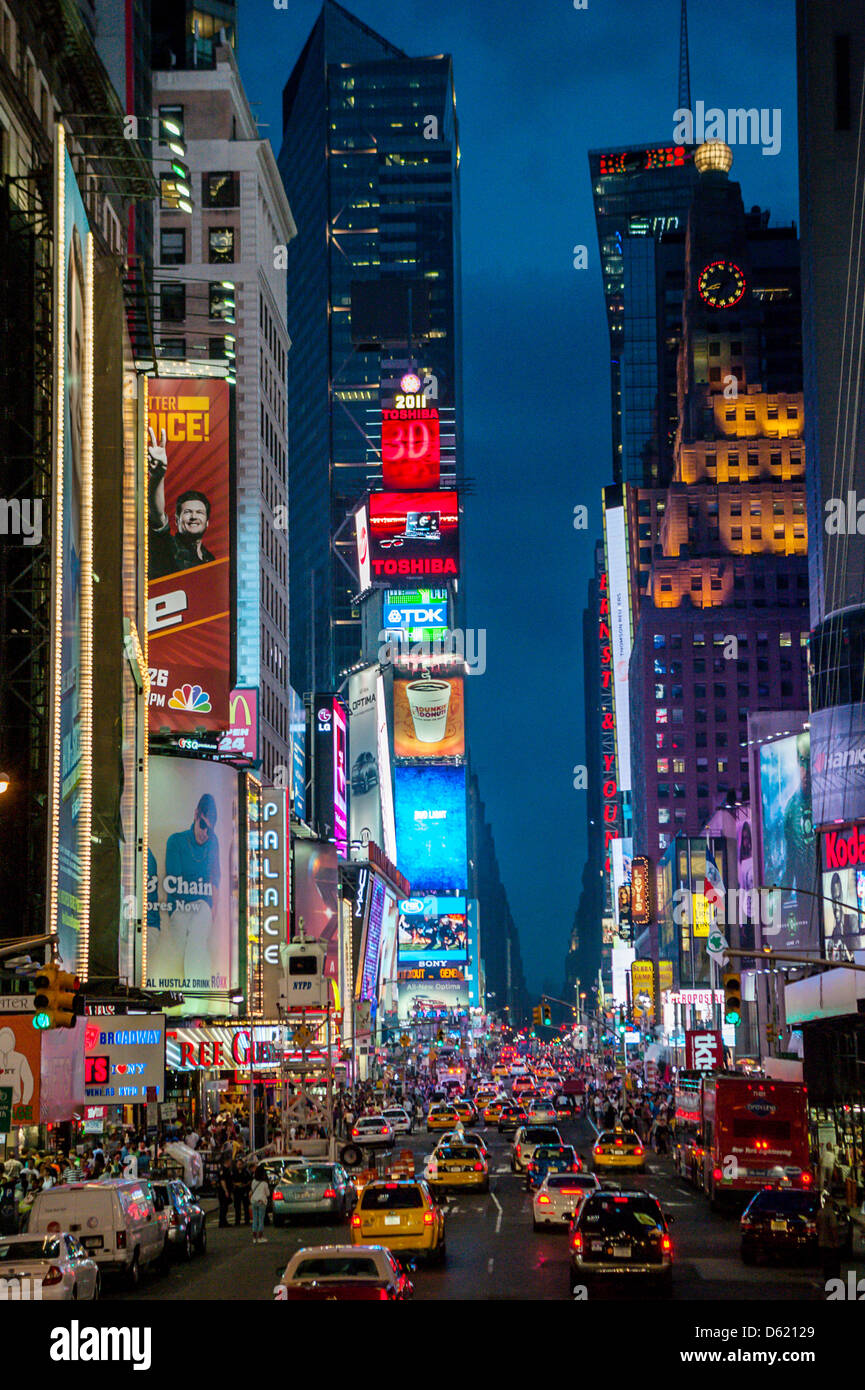 Taxi cabs in New York's Times Square after dark Stock Photo