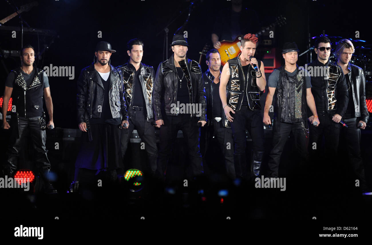 Singers Howie Dorough, Alexander James (AJ) McLean, Jonathan Rasleigh Knight, Donnie Wahlberg, Danny Wood, Joey McIntyre, Brian Littrell, Jordan Knight and Nick Carter of the band NKOTBSB perform on stage during their tour of Germany at O2 World in Berlin, Germany, 07 May 2012. The NKOTBSB Tour is a co-headlining tour between American boy bands New Kids on the Block and the Backstr Stock Photo