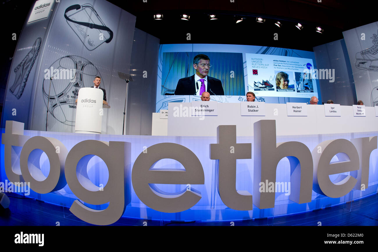 Adidas CEO Herbert Hainer (L) speaks at the sporting goods company's  general meeting in Fuerth, Germany, 10 May 2012. Adidas has made record  sales and profits in 2011. Photo: DANIEL KARMANN Stock Photo - Alamy