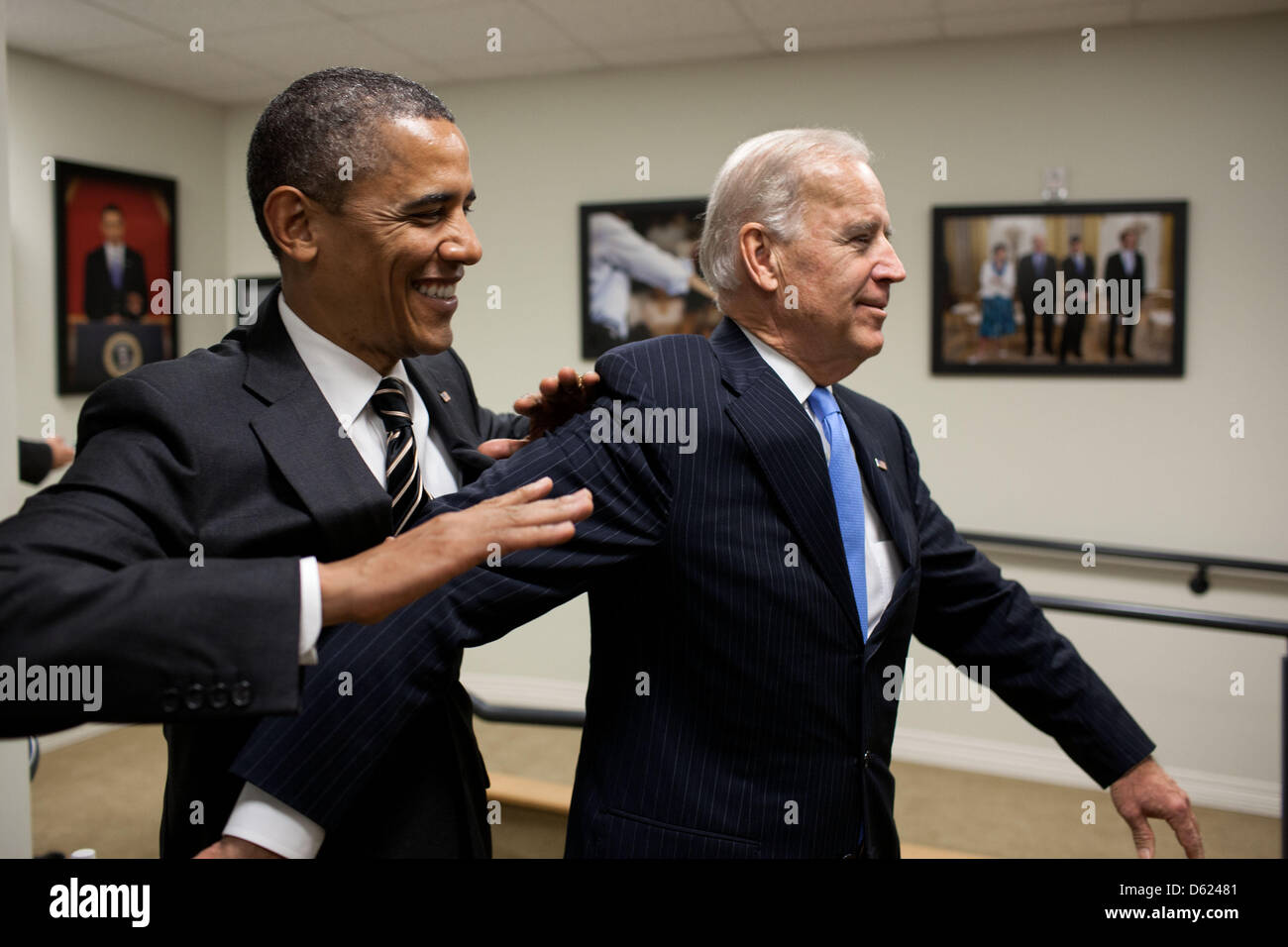 United States President Barack Obama jokes with Vice President Joe Biden backstage before the STOCK Act signing event in the Eisenhower Executive Office Building South Court Auditorium, April 4, 2012. .Mandatory Credit: Pete Souza - White House via CNP Stock Photo
