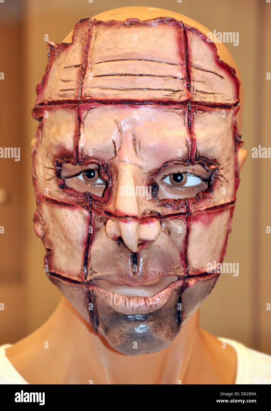 A replica of a horror mask that the police found with a suspect is shows during a press conference in Bielefeld, Germany, 15 May 2012. The violent killing of an 82 year old woman in Bielefeld seems to have been solved. A horror mask and a knife have been found with traces of blood on them at the home of the 18 year old suspect. Photo: Matthias Benirschke Stock Photo