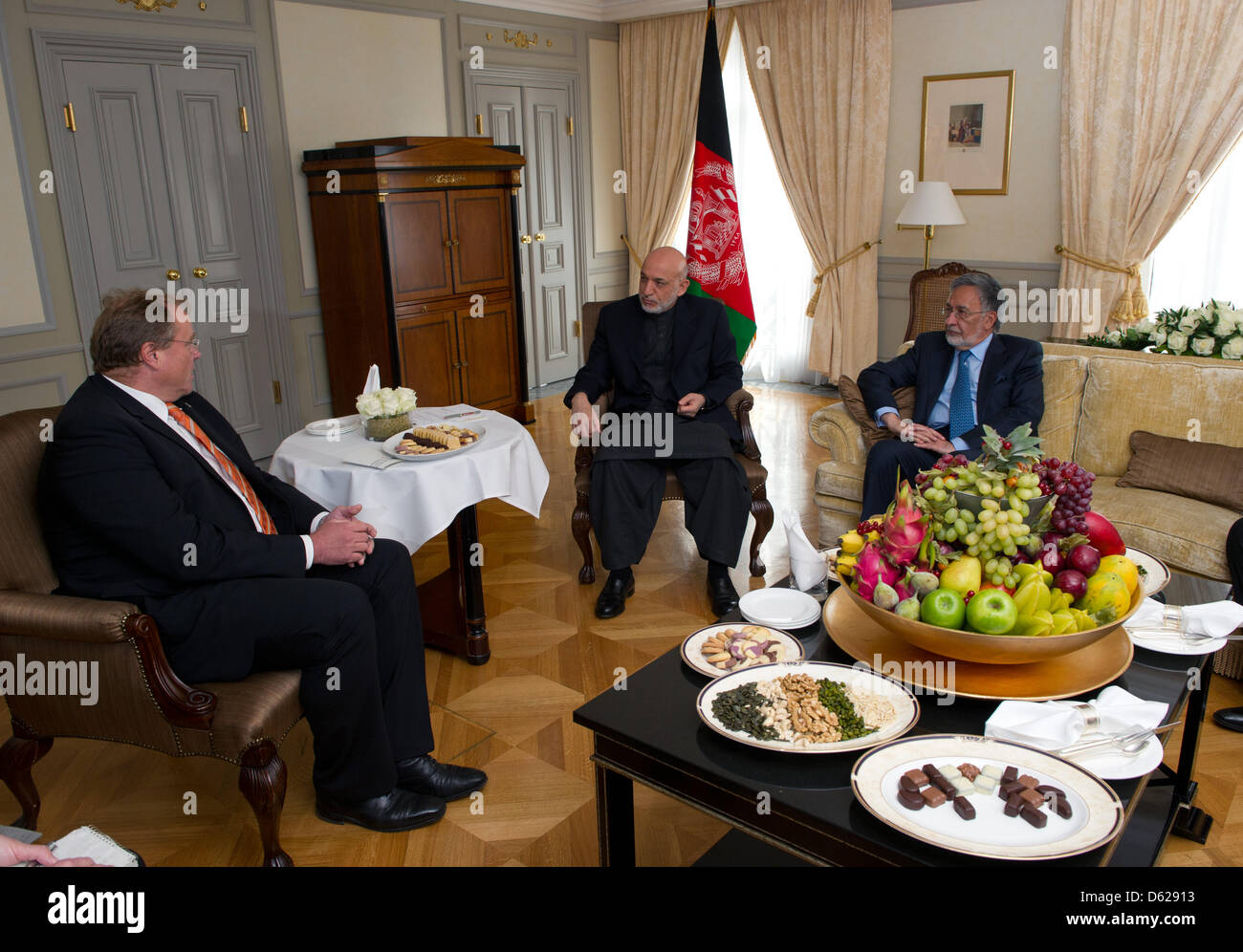 German Foreign Minister Guido Westerwelle (L) and President of Afghanistan Hamid Karsai talks at Hotel Adlon in Berlin, Germany, 16 May 2012. Before, Karzai signed an agreement on the future role of Germany in Afghanistan at the Federal Chancellery. Photo: SOEREN STACHE Stock Photo