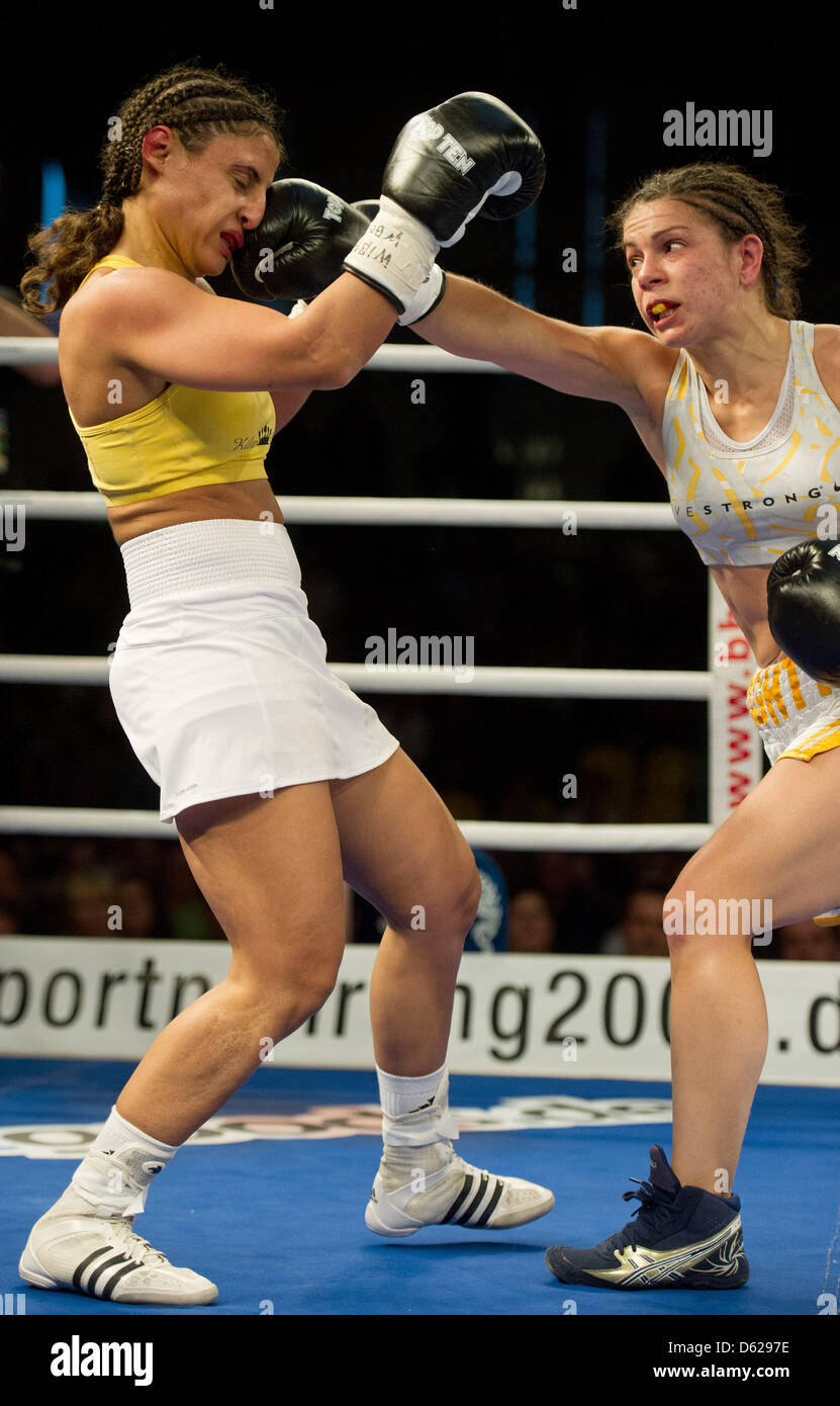 American boxer Melissa McMorrow (R) lands a punch on German opponent Susi  Kentikian at Brandenburg-Halle in Frankfurt (Oder), Germany, 16 May 2012.  Three-time world champion (WBA, WBO, WIBF) Kentikian lost on points