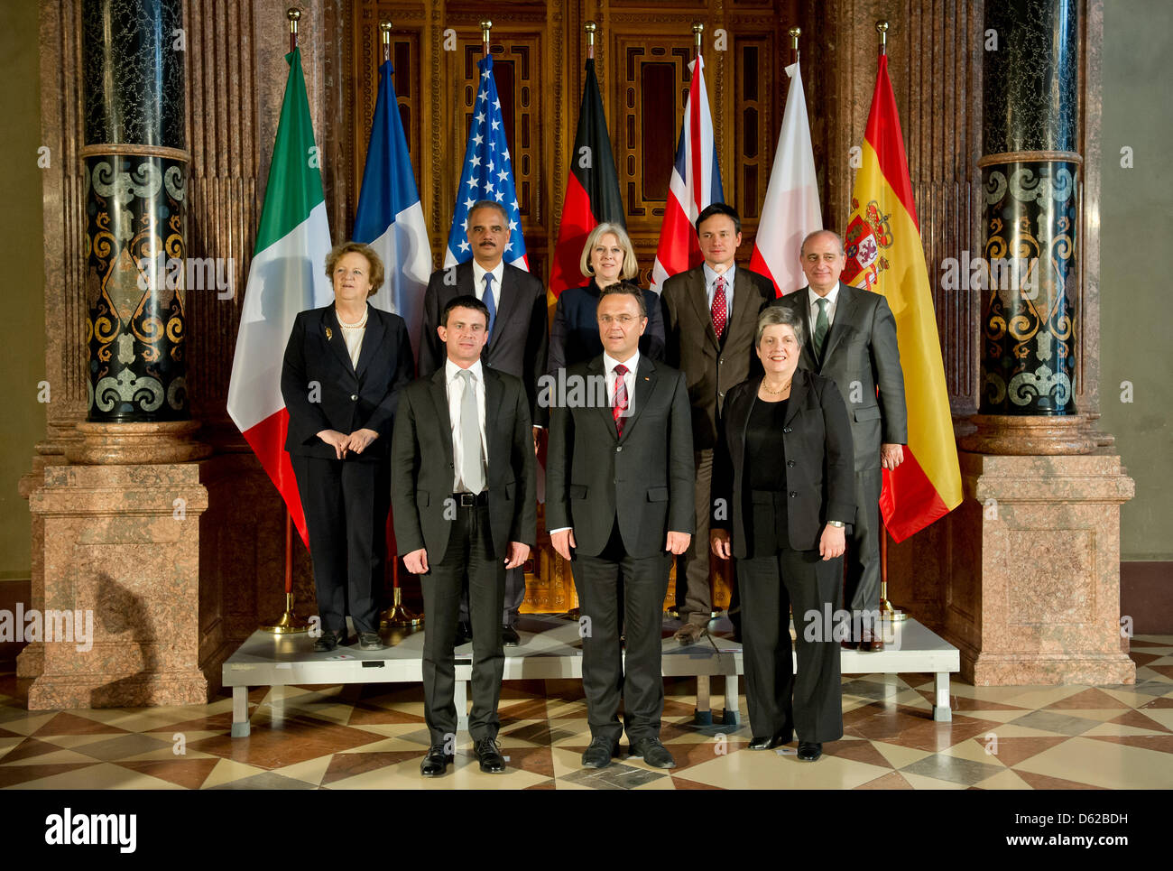 German Interior Minister Hans-Peter Friedrich (fron C) stands with his counterparts Annamaria Cancellieri (Italy, behind L-R), Attorney Gerneal of the USA Eric Holder, Theresa May (United Kingdom), Jacek Cichocki (Poland), Jorge Fernández Díaz (Spain), Manuel Valls (France, front L) and United States Secretary of Homeland Security Janet Napolitano (front R) during the G6 meeting of Stock Photo
