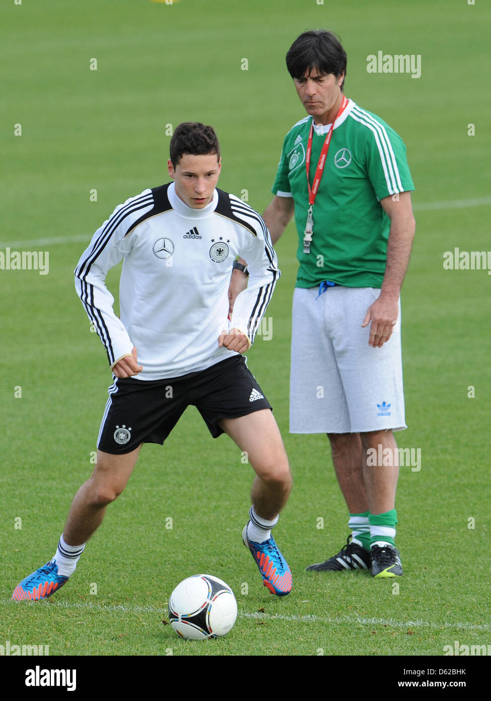 Germany's Julian Draxler (L) practices under the eyes of head coach Joachim Loew on a pitch near Callian, France, 18 May 2012. The German national team is preparing for the Euro 2012 in southern France until 20 May. Photo: ANDREAS GEBERT Stock Photo