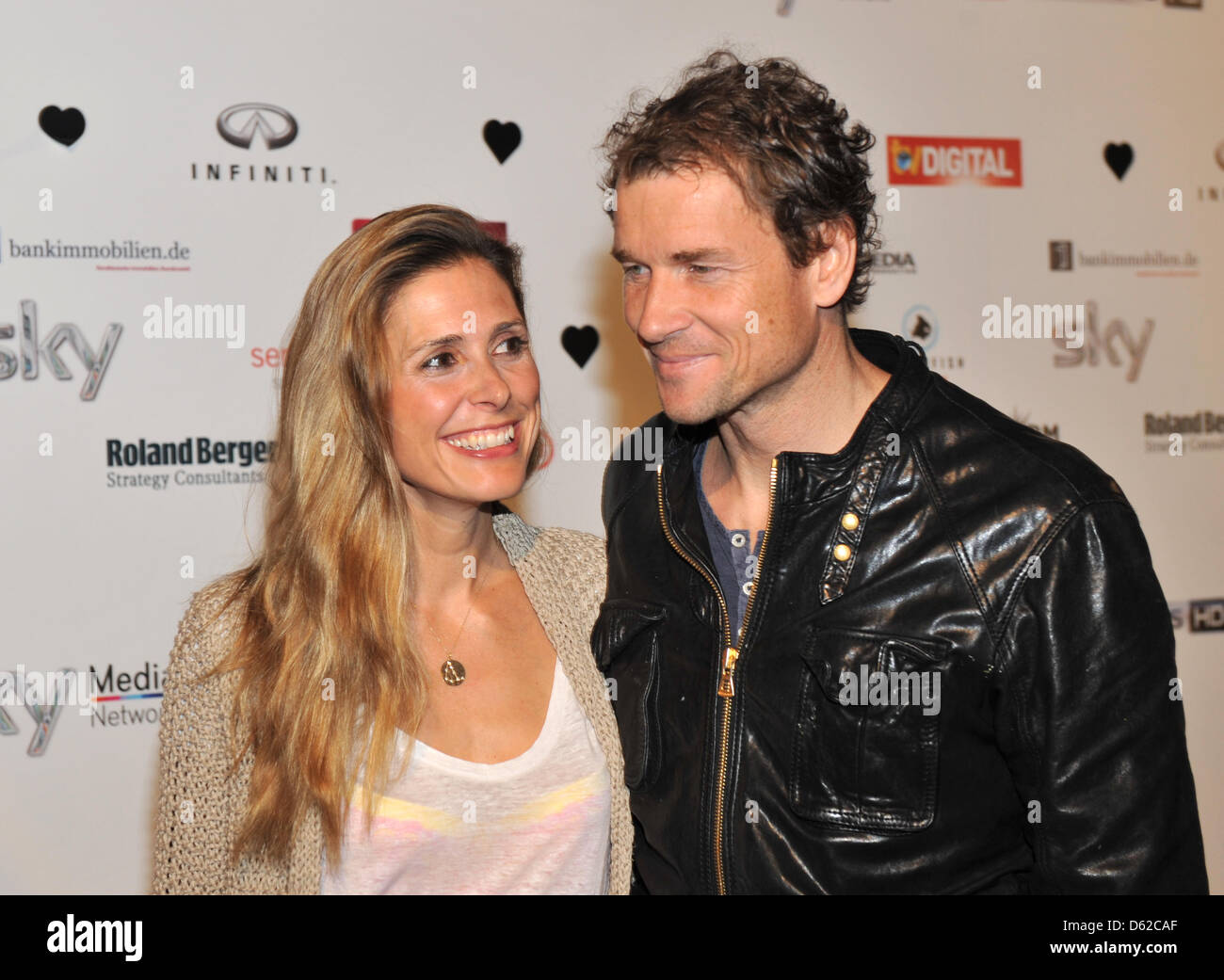 Former national soccer goalkeeper Jens Lehmann and his wife Cornelia arrive at the 'Sky Champions Night' hosted by boradcaster Sky Deutschland at 'Heart' in Munich, Germany, 18 May 2012. The party was initiated, due to the Championsleague final match between FC Bayern Munich and FC Chelsea on 19 May 2012. Foto: Ursula Dueren Stock Photo