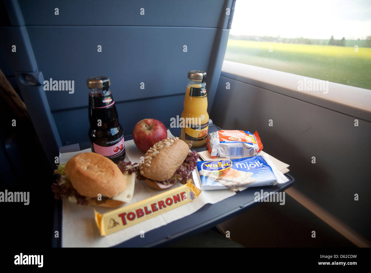 An abundant meal at your seat to enjoy aboard Germany's comfortable and fast moving trains. Stock Photo
