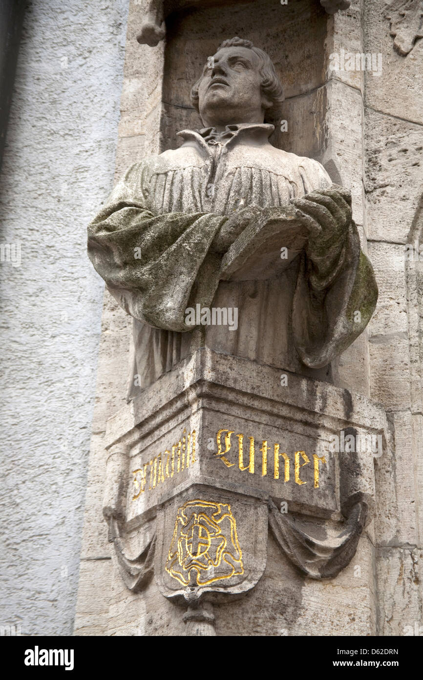 Statue of Martin Luther at entrance of Lutheran Seminary in Old Town Regensburg, Germany, an UNESCO World Heritage Site. Stock Photo