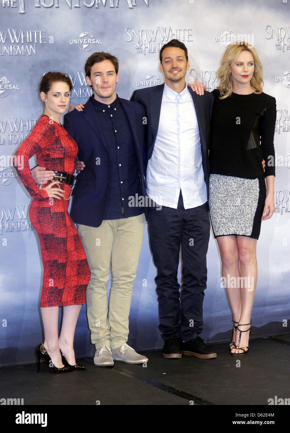 The actors Kristen Stewart (L-R), Sam Claflin, director Rupert Sanders and Charlize Theron pose for the cameras during a photocall and a fan event for the movie 'Snow White and the Huntsman' in Berlin, Germany, 16 May 2012. The movie will be aired to German cinemas on 31 May 2012. Photo: Xamax Stock Photo