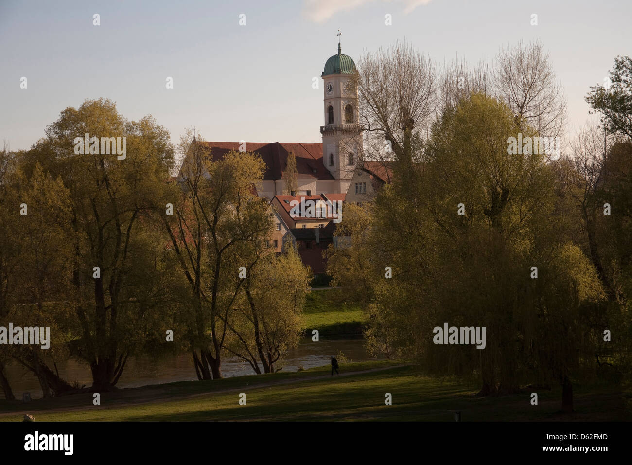 View of a church on an island in the Danube River from the Stone Bridge of Regensburg, Germany, a UNESCO World Heritage Site. Stock Photo