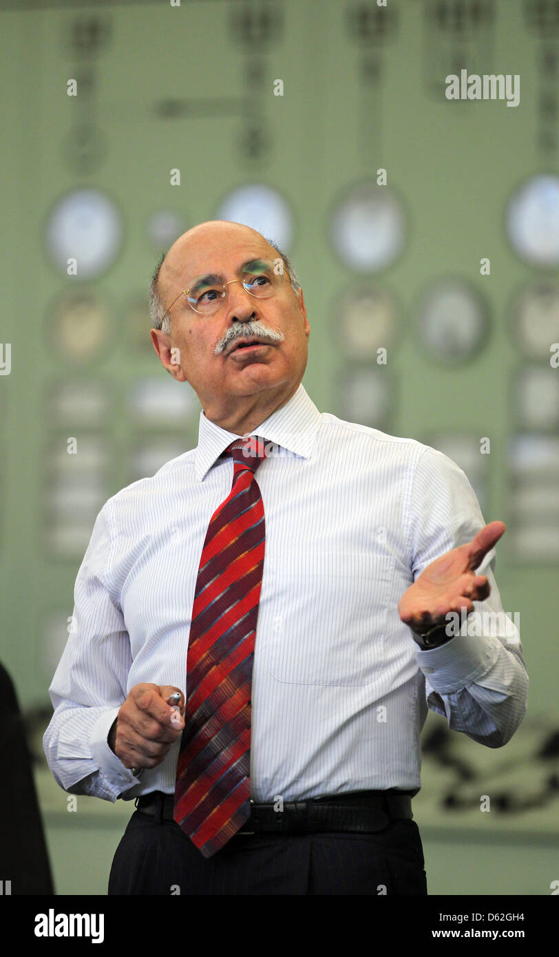 Head of the Lausitz and Middle-German Mining Administration, Mahmut Kuyumcu, speaks during a press conference in the control room of the former power plant Espenhain, Germany, 22 May 2012. The recultivation of East German lignite fields is making progress. According to the Lausitz and Middle-German Mining Administration, some 9.2 billion euros have been invested in the renovation o Stock Photo