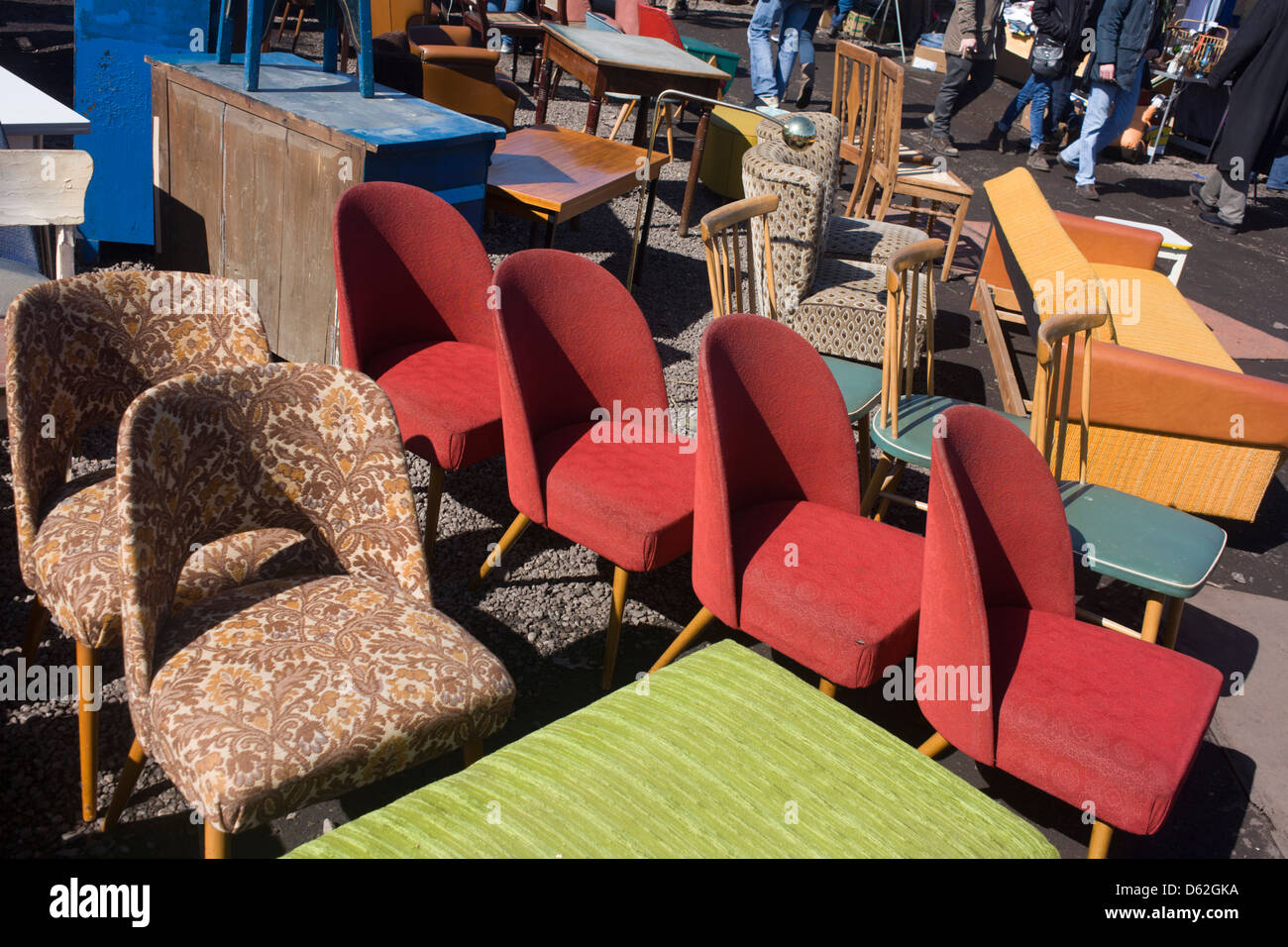 1950s-era chairs and assorted furniture, bric-a-brac and old possessions being sold at a giant market in Mauerpark - an open space on the site of the old Berlin wall, the former border between Communist East and West Berlin during the Cold War. Stock Photo