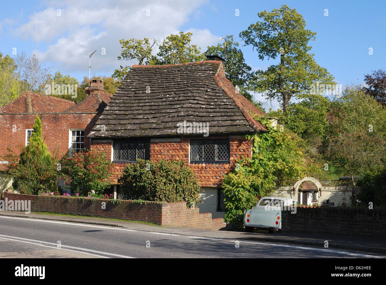 Brick and tile cottage in the village of Chiddingfold. Surrey. England Stock Photo