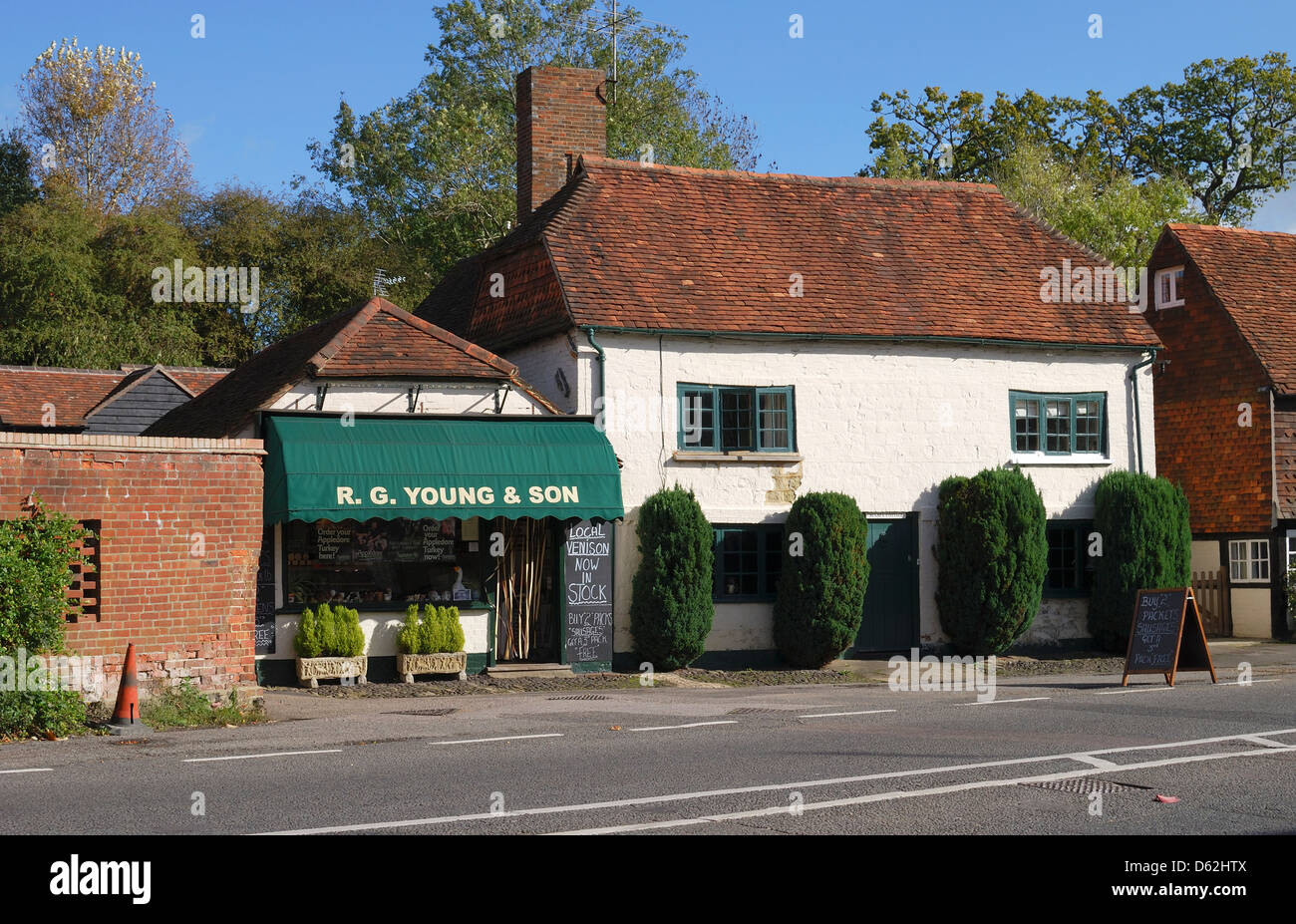 Butchers shop and Brick and tile cottages in the village of