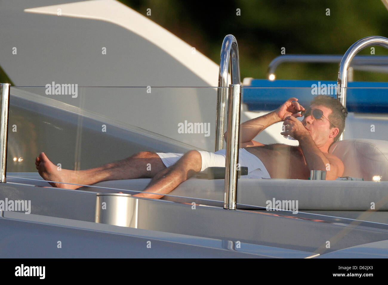 Simon Cowell lounging on his yacht, 'Slipstream' Celebrities relaxing