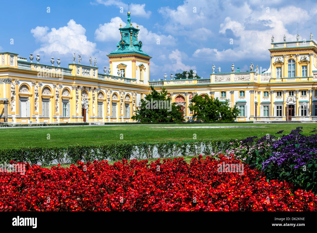 Red begonias in front of the 17th century Wilanów Royal Palace in Warsaw,Poland. Stock Photo