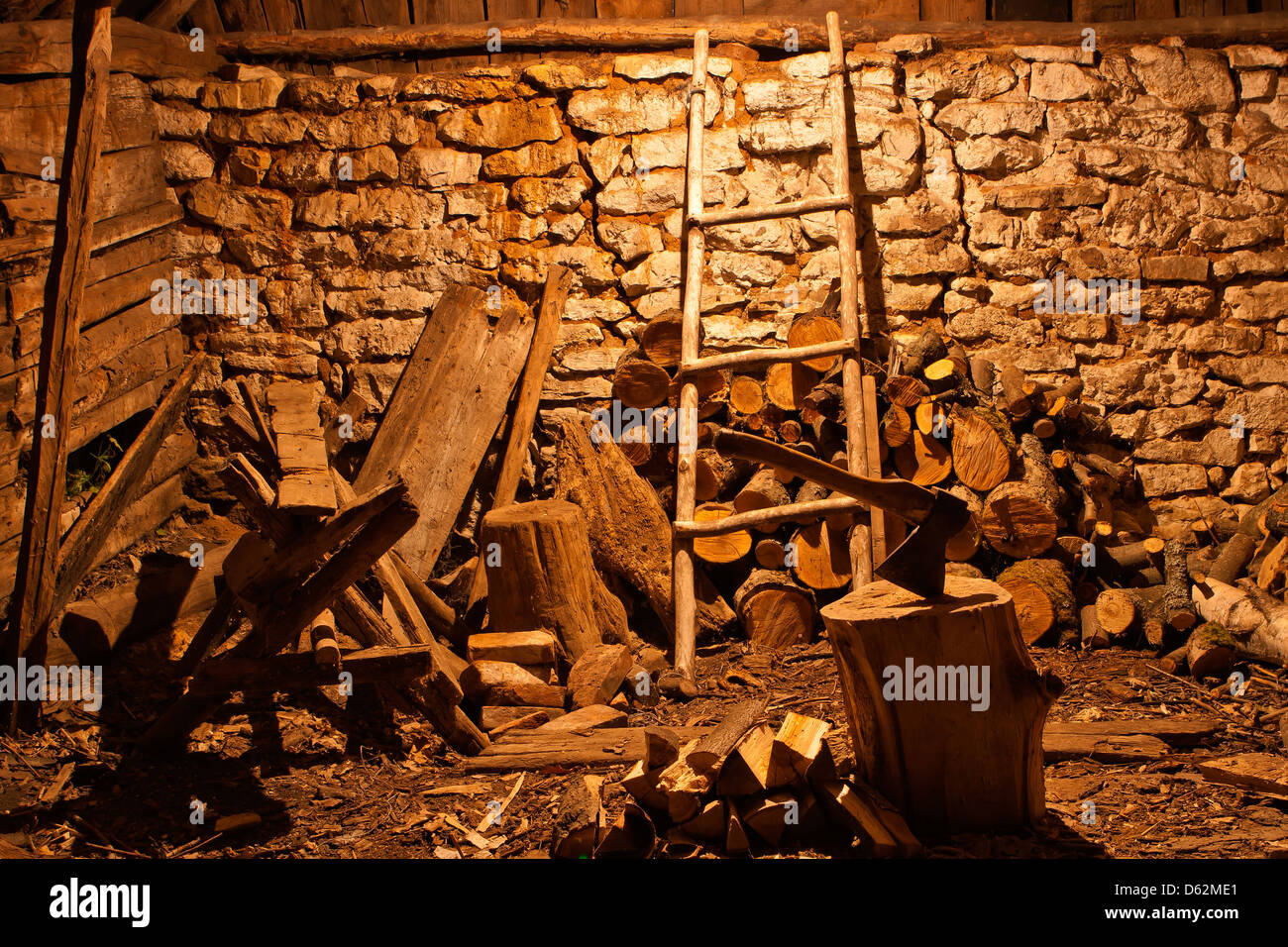 Inside old fire wood shed Stock Photo