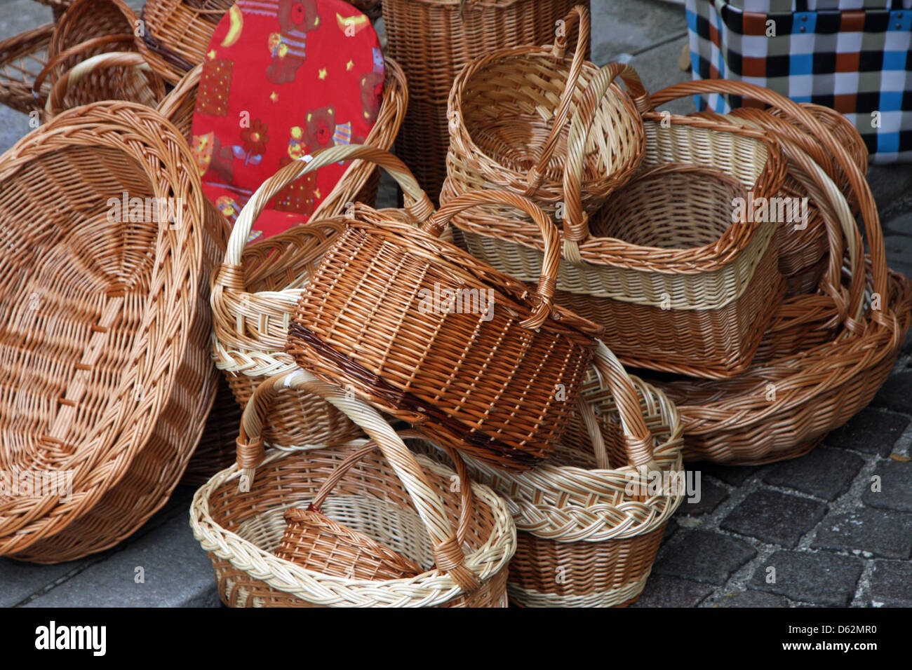 pile of Wicker baskets for sale at the local market Stock Photo Alamy