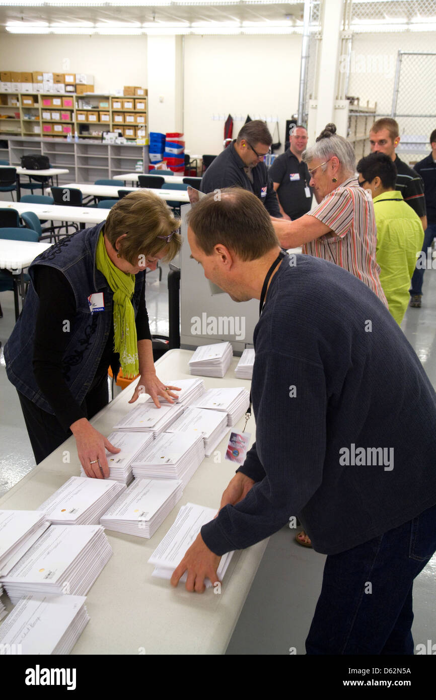 Election workers receiving absentee voter ballots in envelopes at the Ada County Elections building in Boise, Idaho, USA. Stock Photo