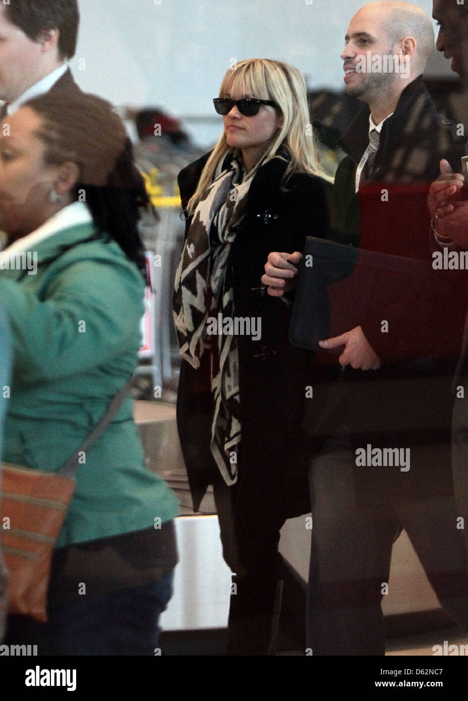 Reese Witherspoon arriving at Charles De Gaulle Airport Paris, France