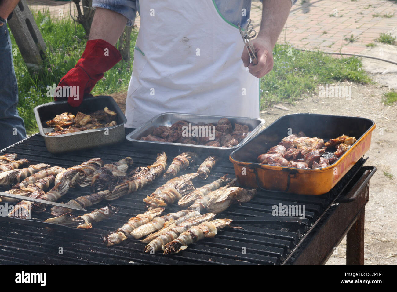Cook while cooking in a giant grid of an outdoor barbecue for grilling ...