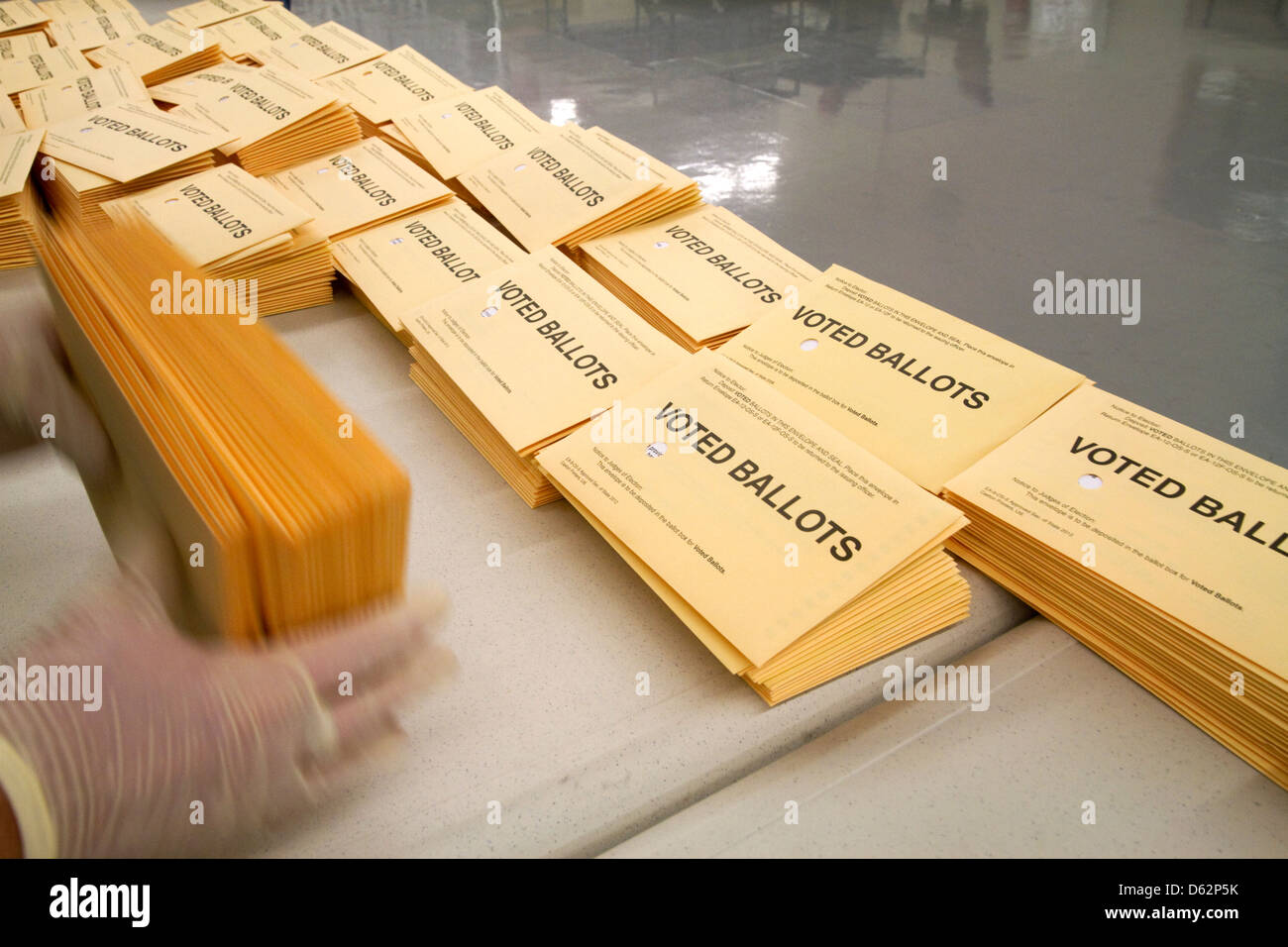 Absentee ballots being sorted and prepared for recording at the Ada County Elections building in Boise, Idaho, USA. Stock Photo