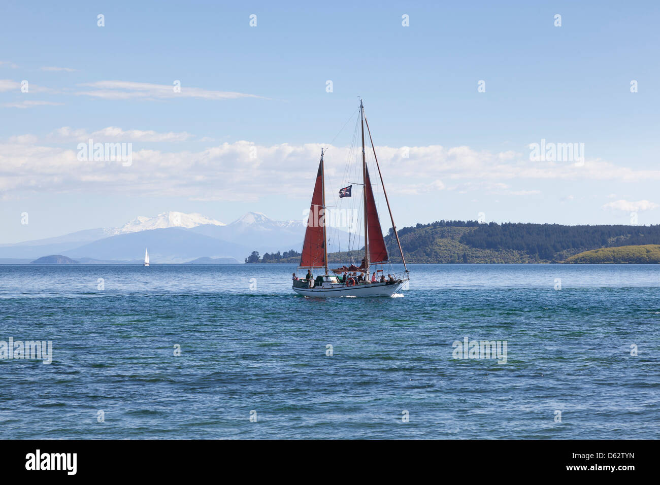 Lake Taupo from Taupo with a sailing vessel Stock Photo Alamy