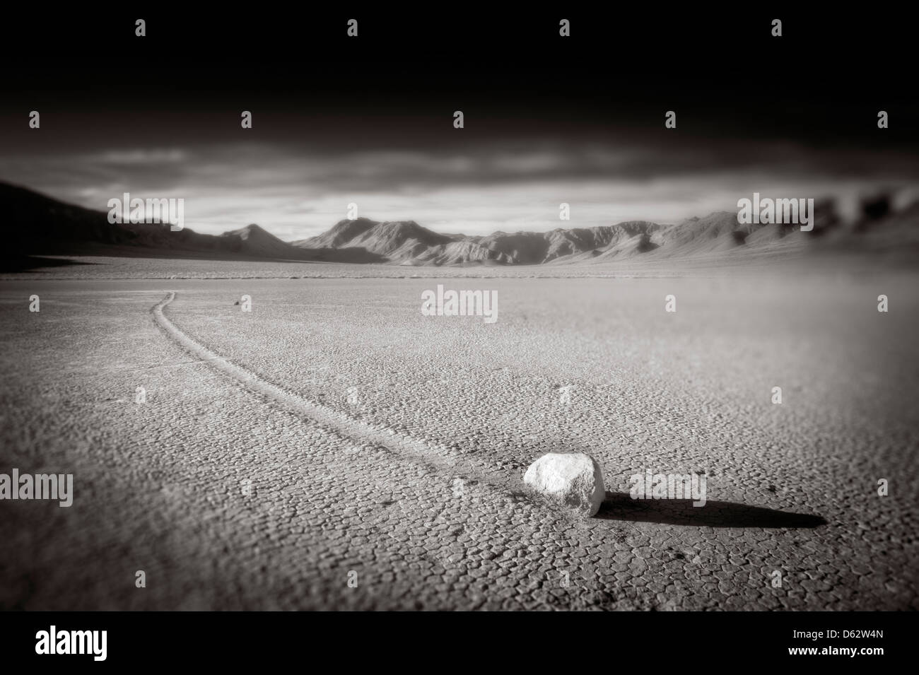 Moving rock at The Racetrack, Death Valley, California, USA Stock Photo