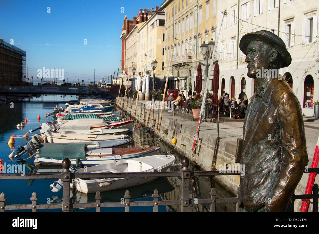 Europe; Italy; Italian; North; Trieste; Friuli Venezia Giulia; Shadow; Canal; Boats; Buildings; Water; River; Statue; Monument; Stock Photo