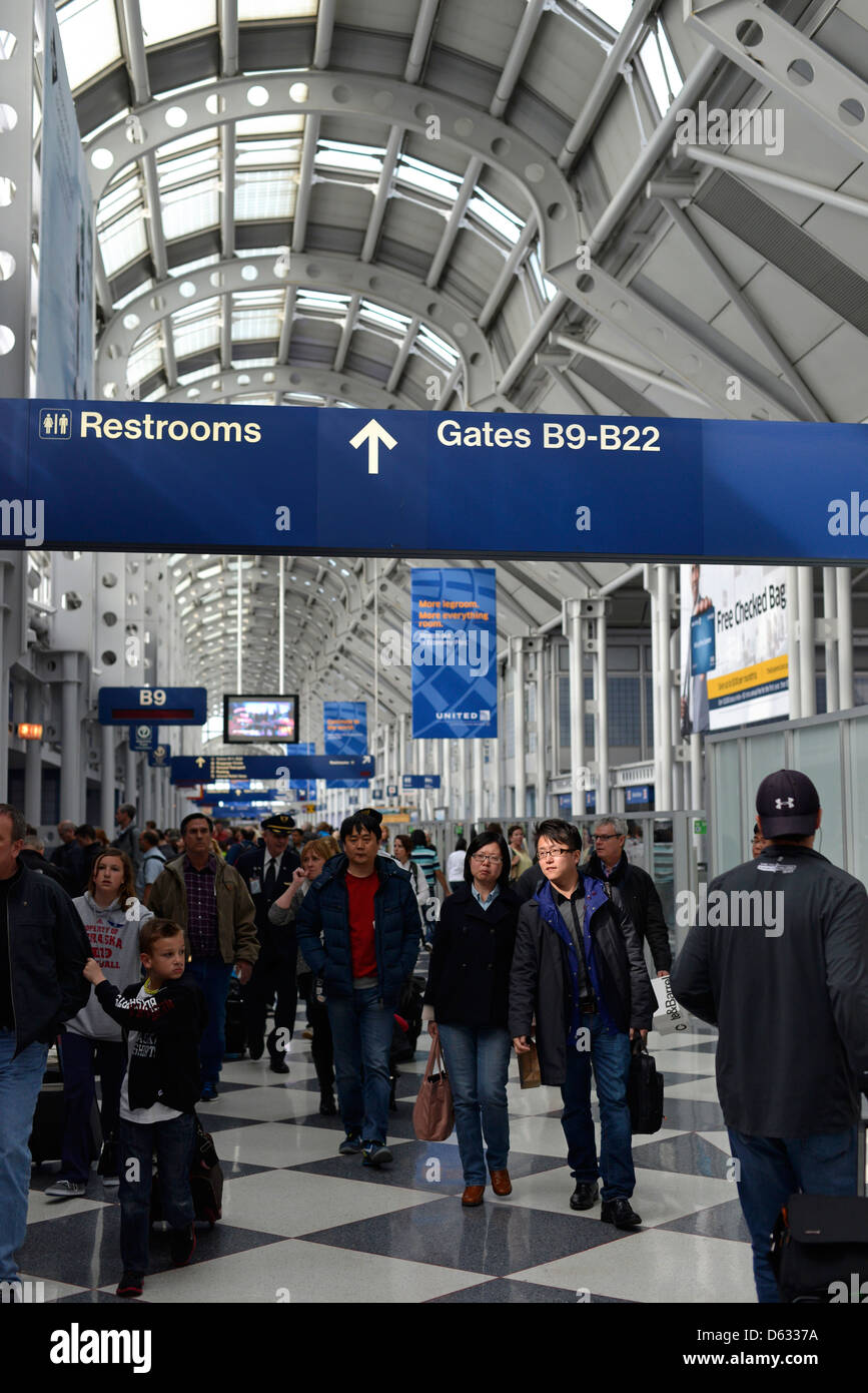 Travelers in the B concourse in Chicago's O'Hare International Airport, Illinois. Stock Photo