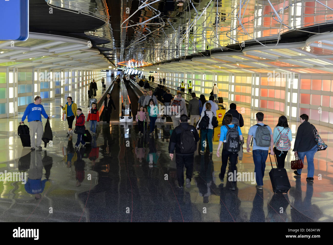 Travelers in the subterranean corridor in Chicago's O'Hare International Airport, Illinois. Stock Photo