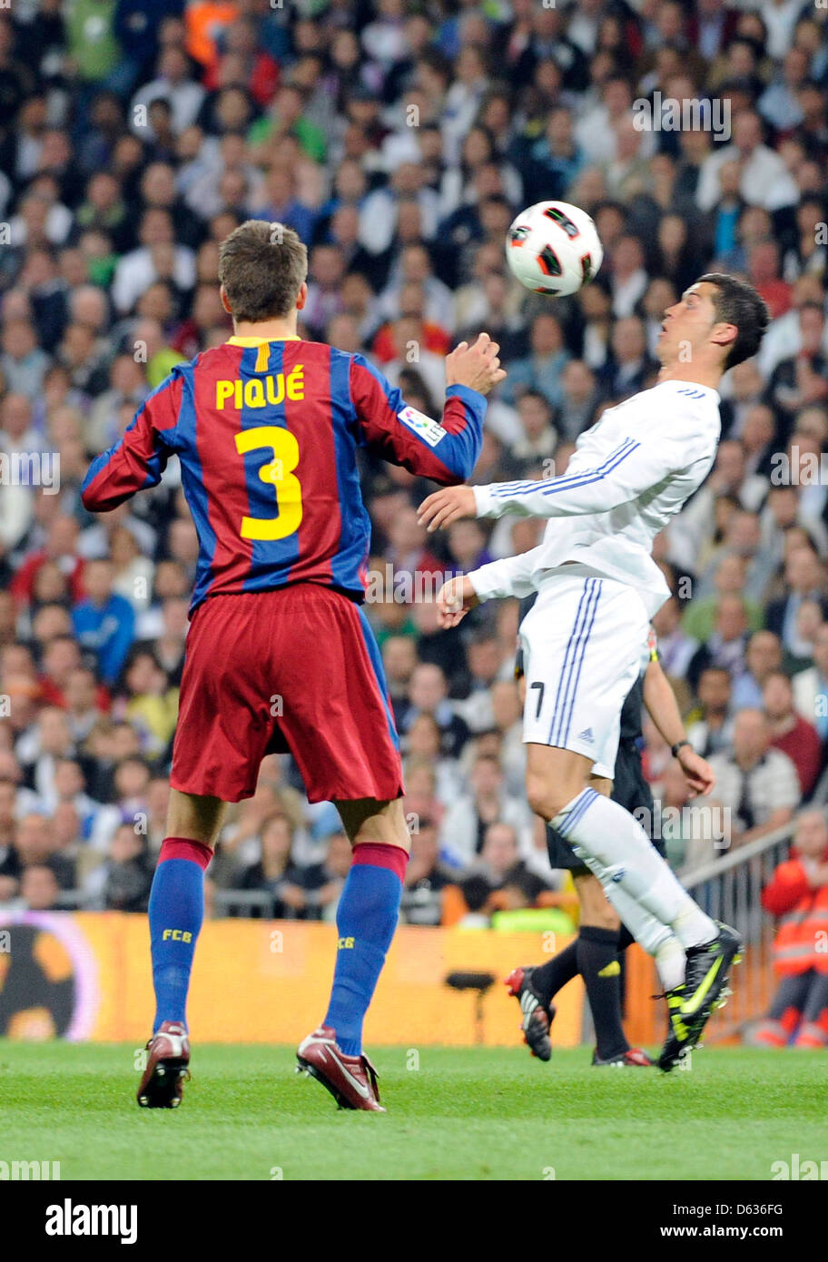 Pique, Ronaldo Real Madrid playing against FC Barcelona at the Spanish