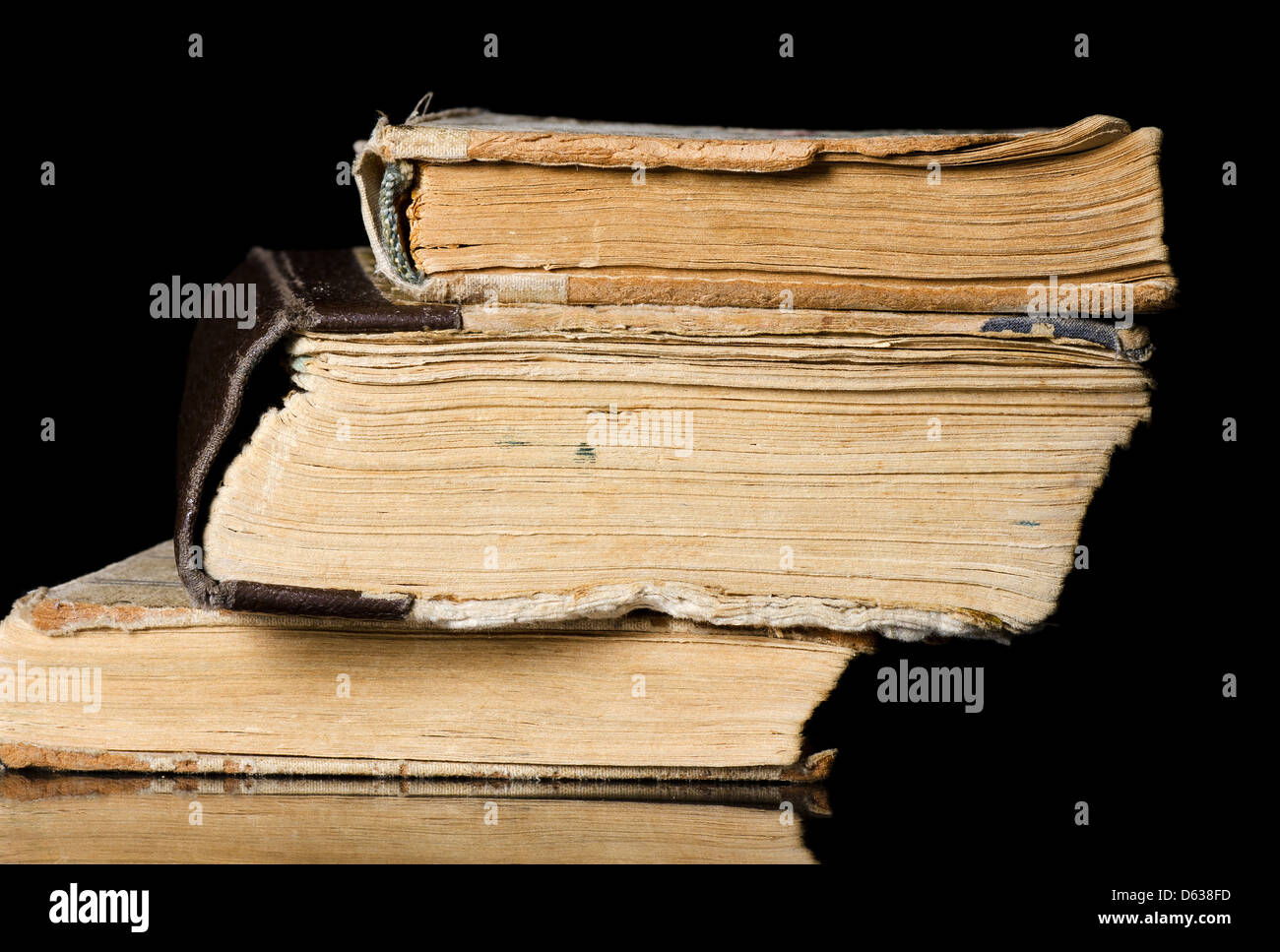 Pile of old books on black Stock Photo Alamy