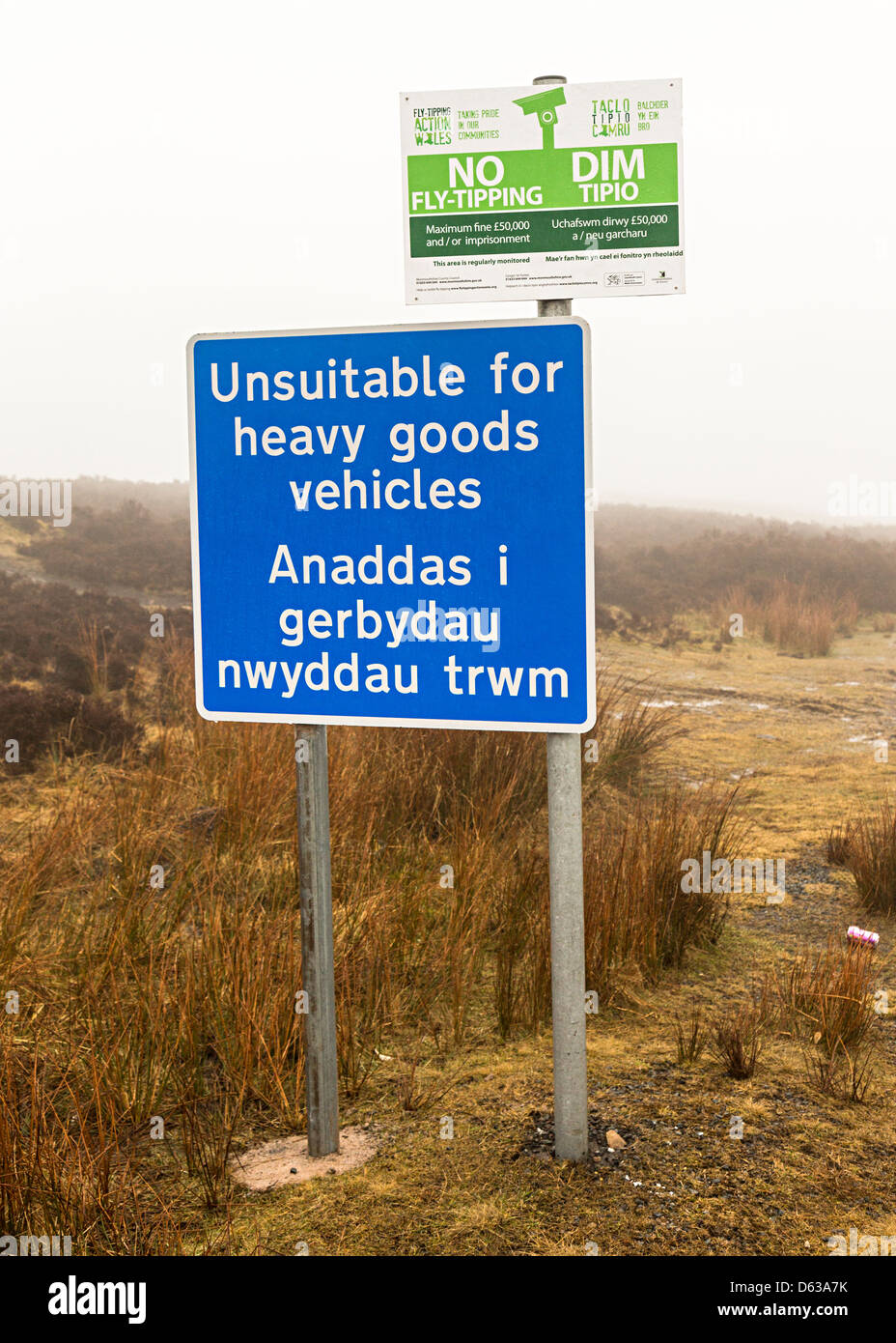 Sign on remote road unsuitable for heavy goods vehicles and no tipping in Welsh and English, Blorenge mountain, Wales UK Stock Photo