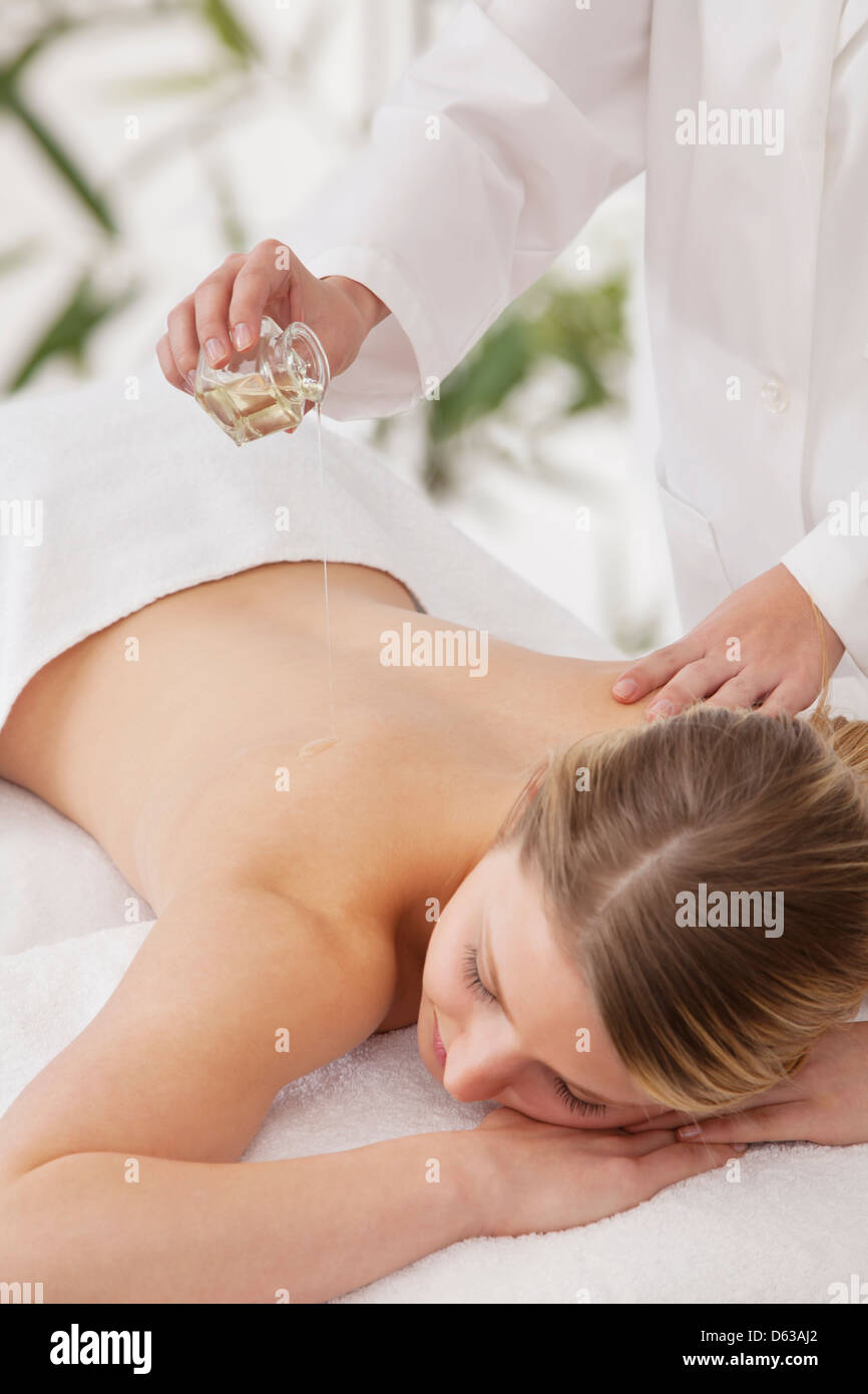 Woman receiving massage Stock Photo