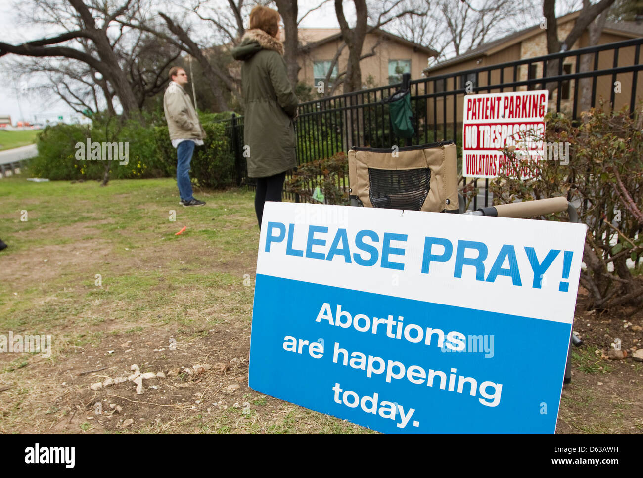Several volunteers pray outside a South Austin clinic where abortions are performed as part of the pro-life campaign Stock Photo