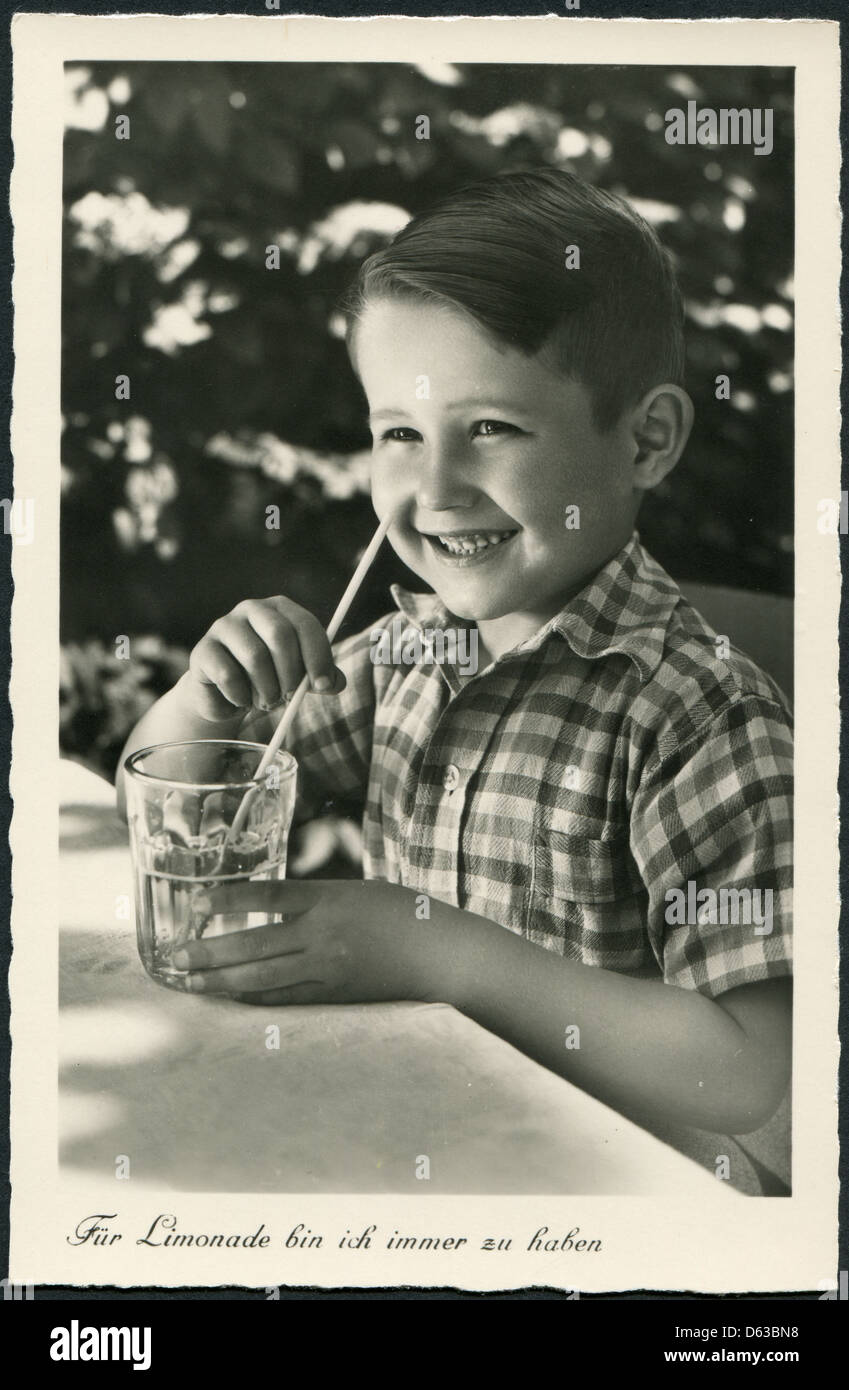 Child Drinking Through Straw Stock Photos & Child Drinking Through