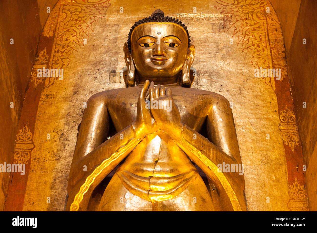Large golden Kassapa Buddha inside Ananda Temple, Old Bagan, Bagan, Myanmar, (Burma) Stock Photo