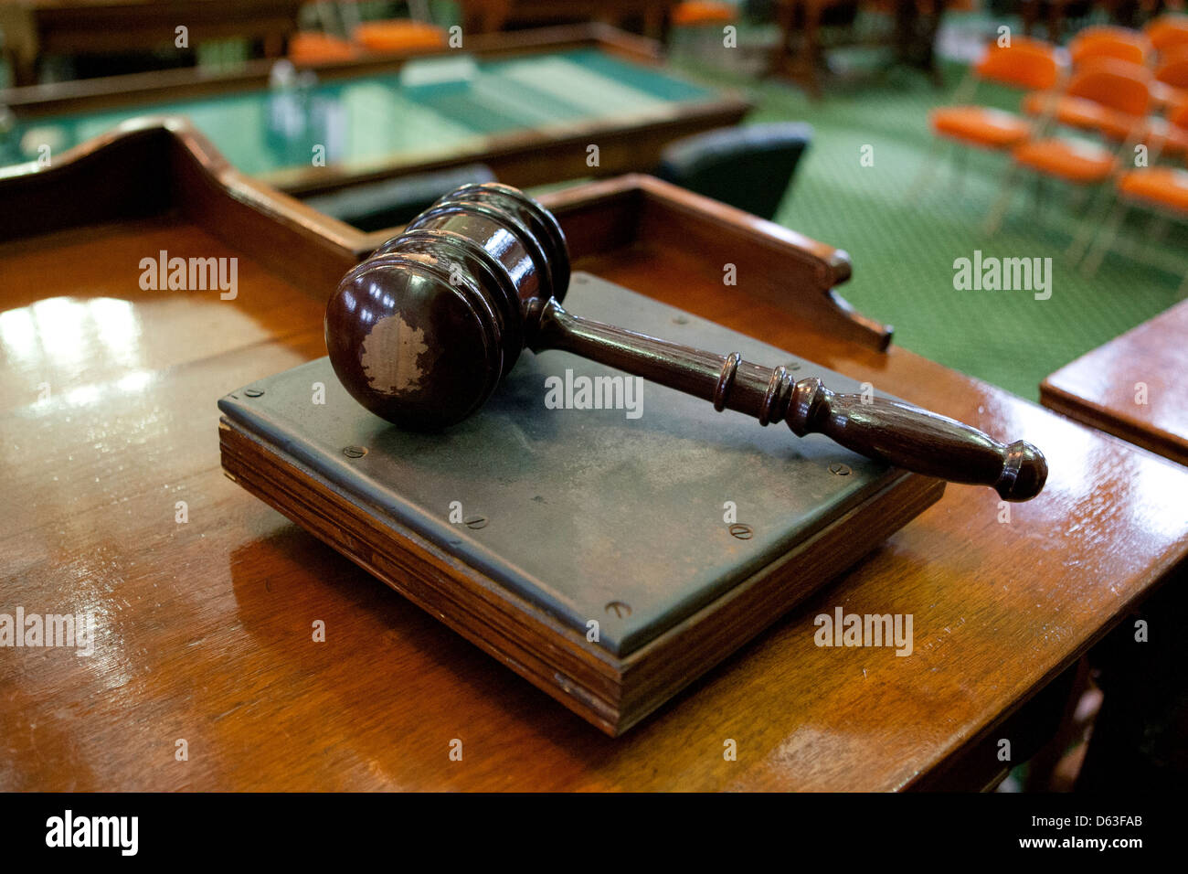 Wood gavel lays on desk inside the Senate of the Texas Capitol building in Austin, Texas Stock Photo