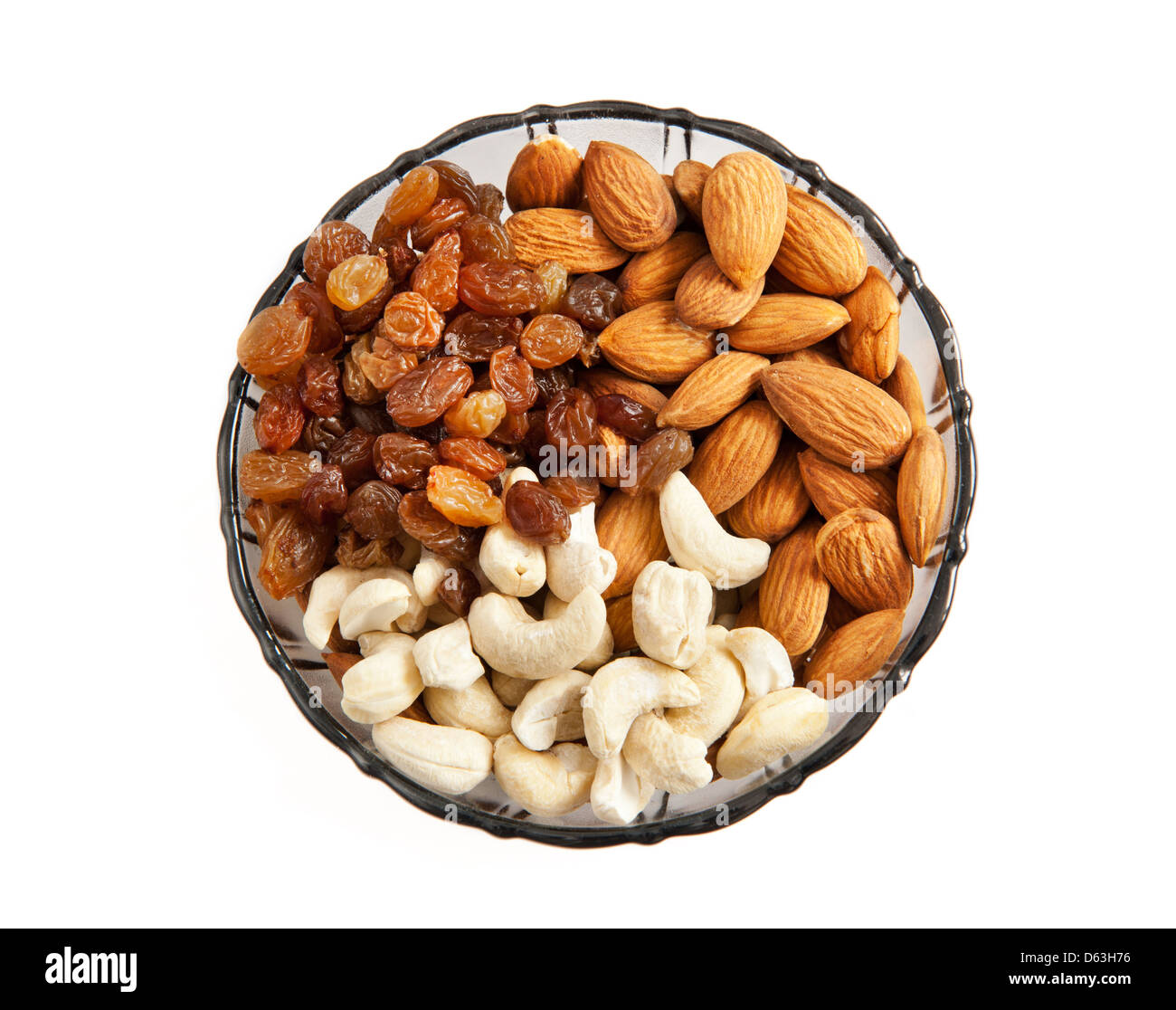 raisins almonds and cashews in glass bowl Stock Photo Alamy