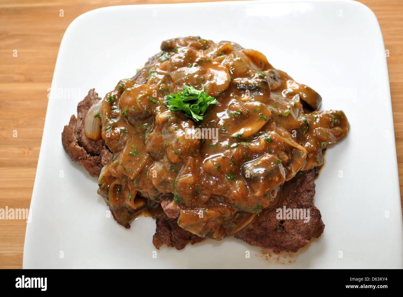 Fresh Beef Liver with Mushroom and Onion Gravy Stock Photo