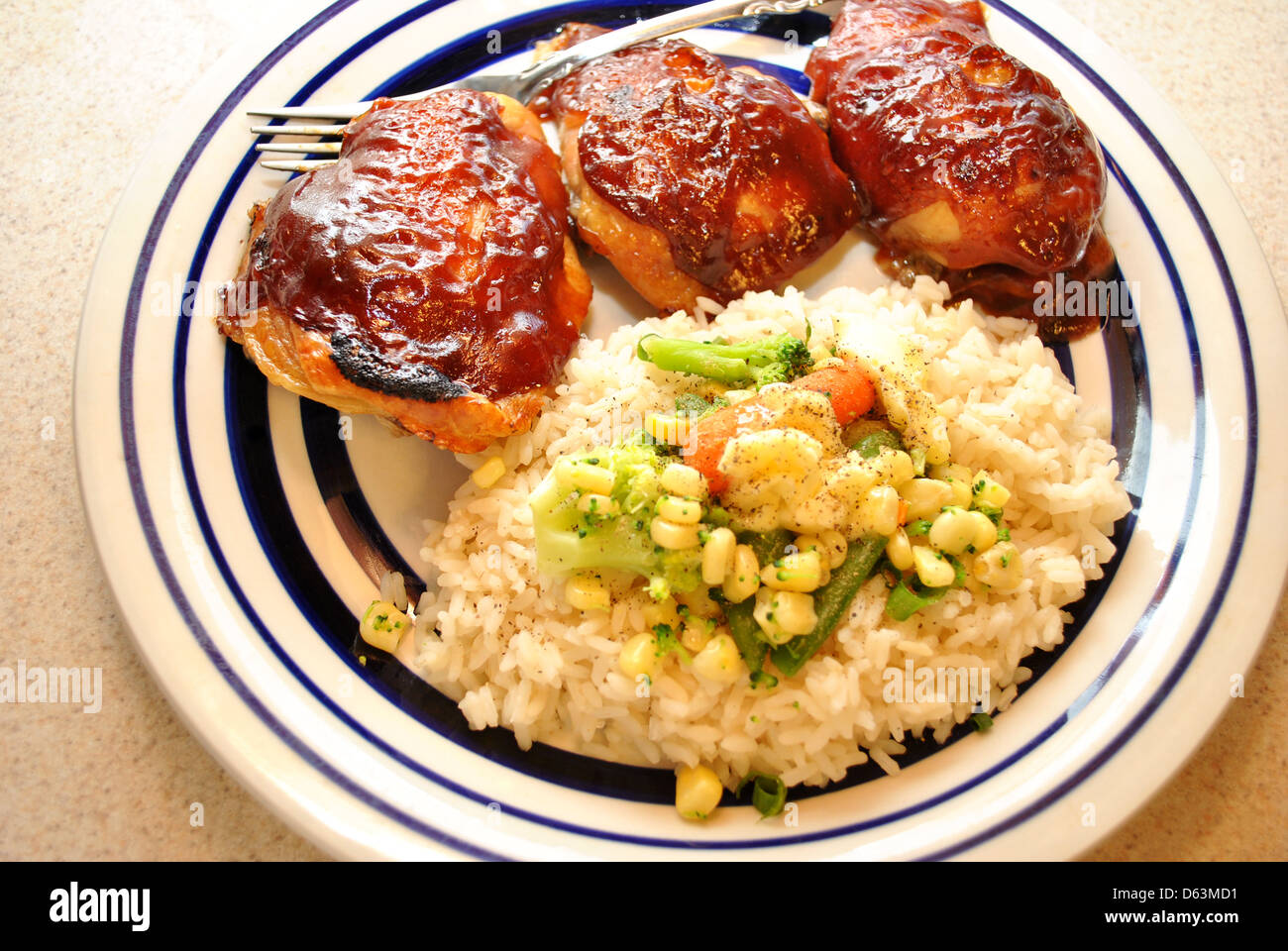 BBQ Chicken with Rice and Veggies Stock Photo