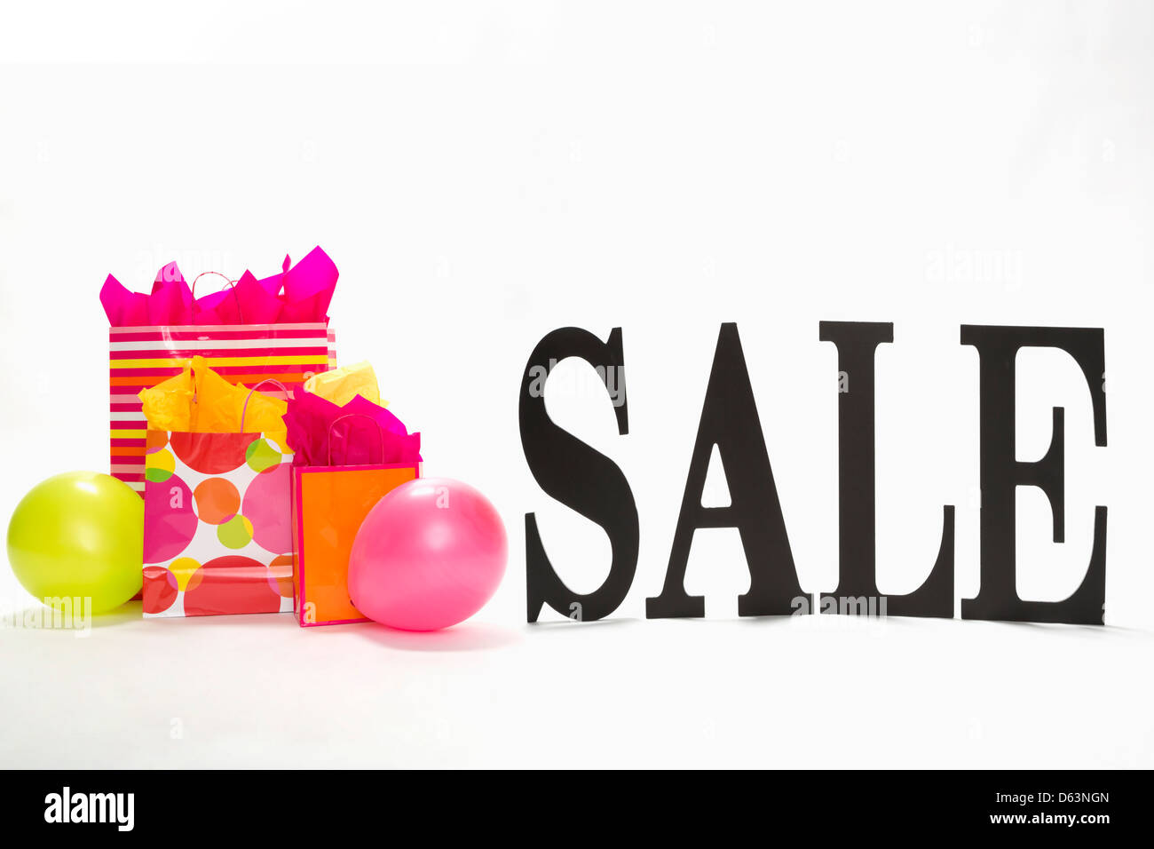 Sale sign with balloons and presents Stock Photo